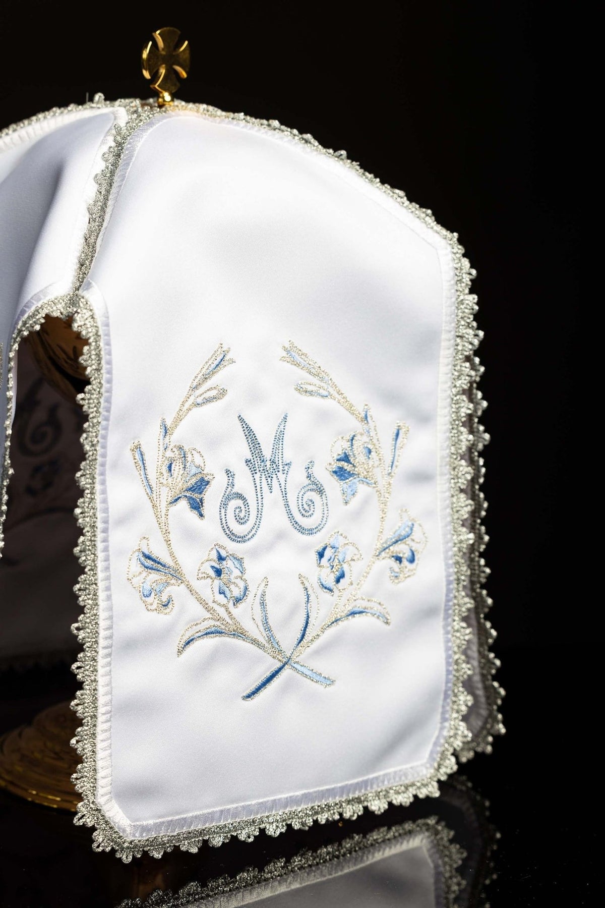 White ciborium veil front view with silver Marian embroidery and gold cross fitting