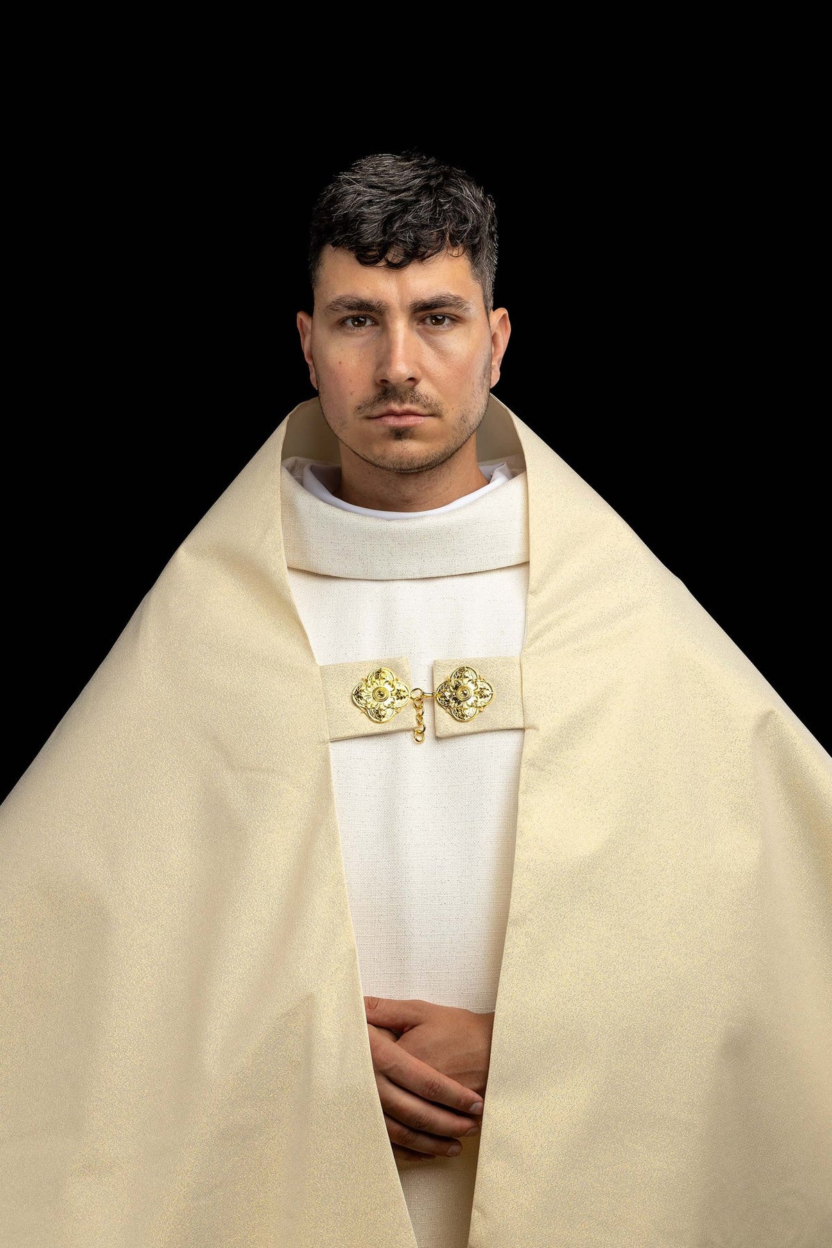 Humeral veil front view with cream fabric and ornate gold clasp