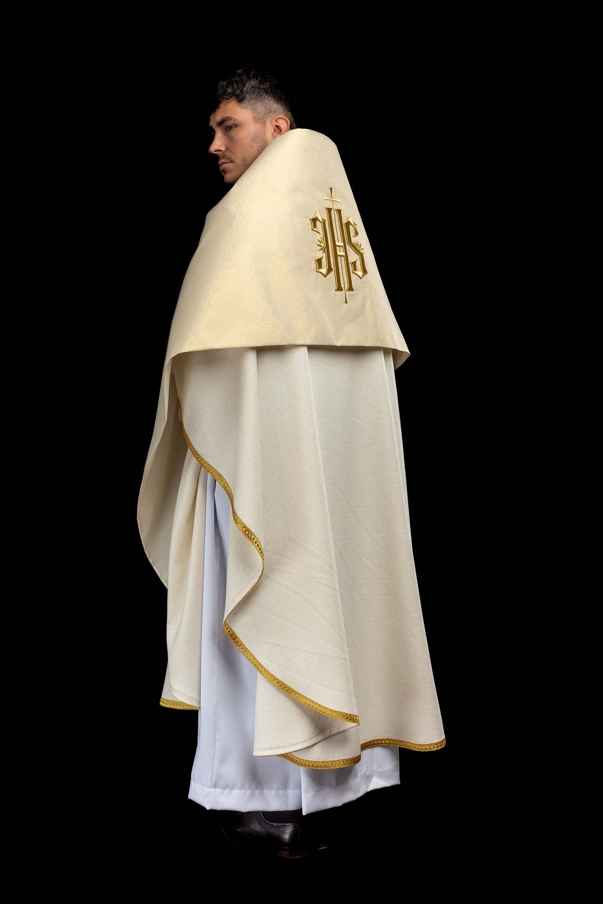 Humeral veil side view with gold embroidered IHS symbol and gold trim