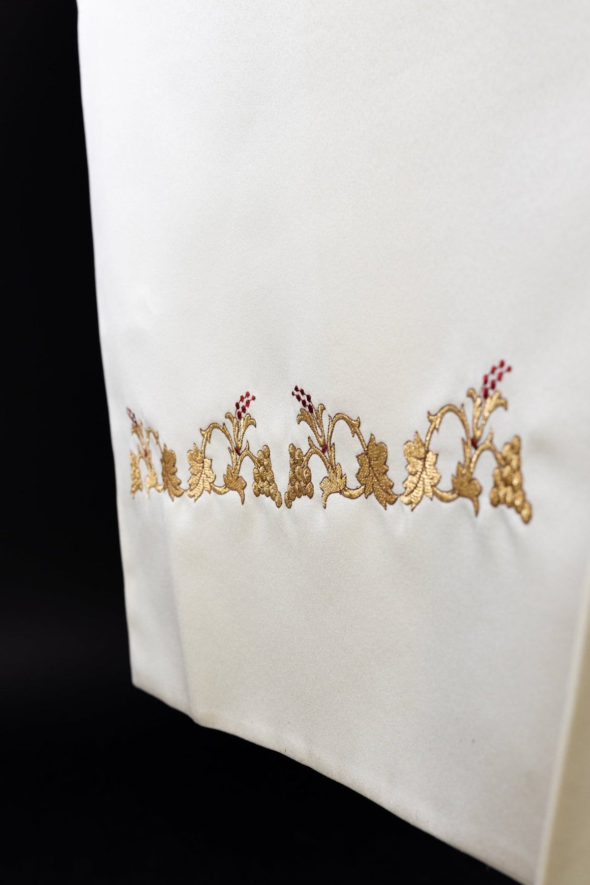 Ecru liturgical veil close-up showing gold floral border embroidery
