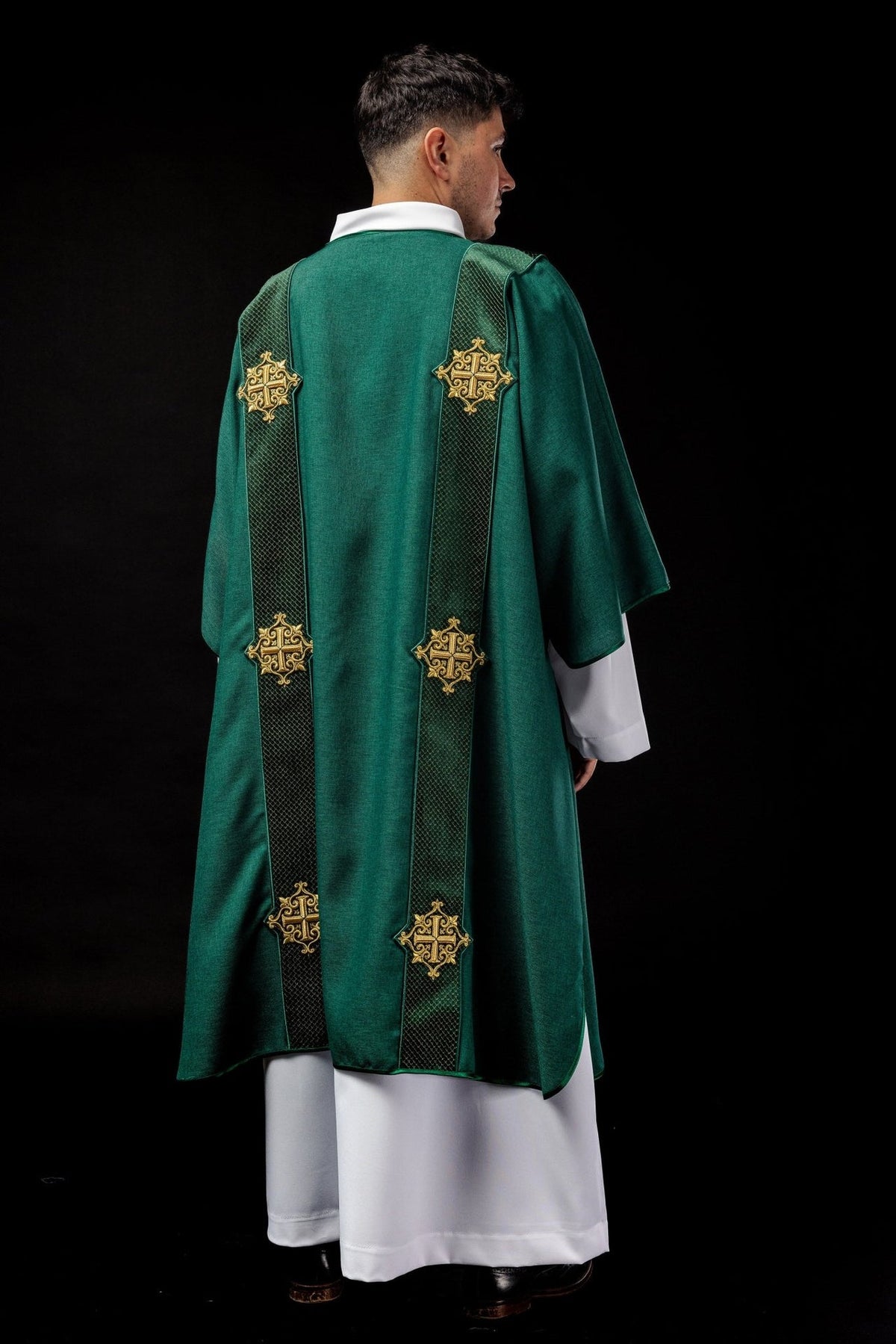 Green velvet dalmatic, back view with paired orphreys and embroidered crosses