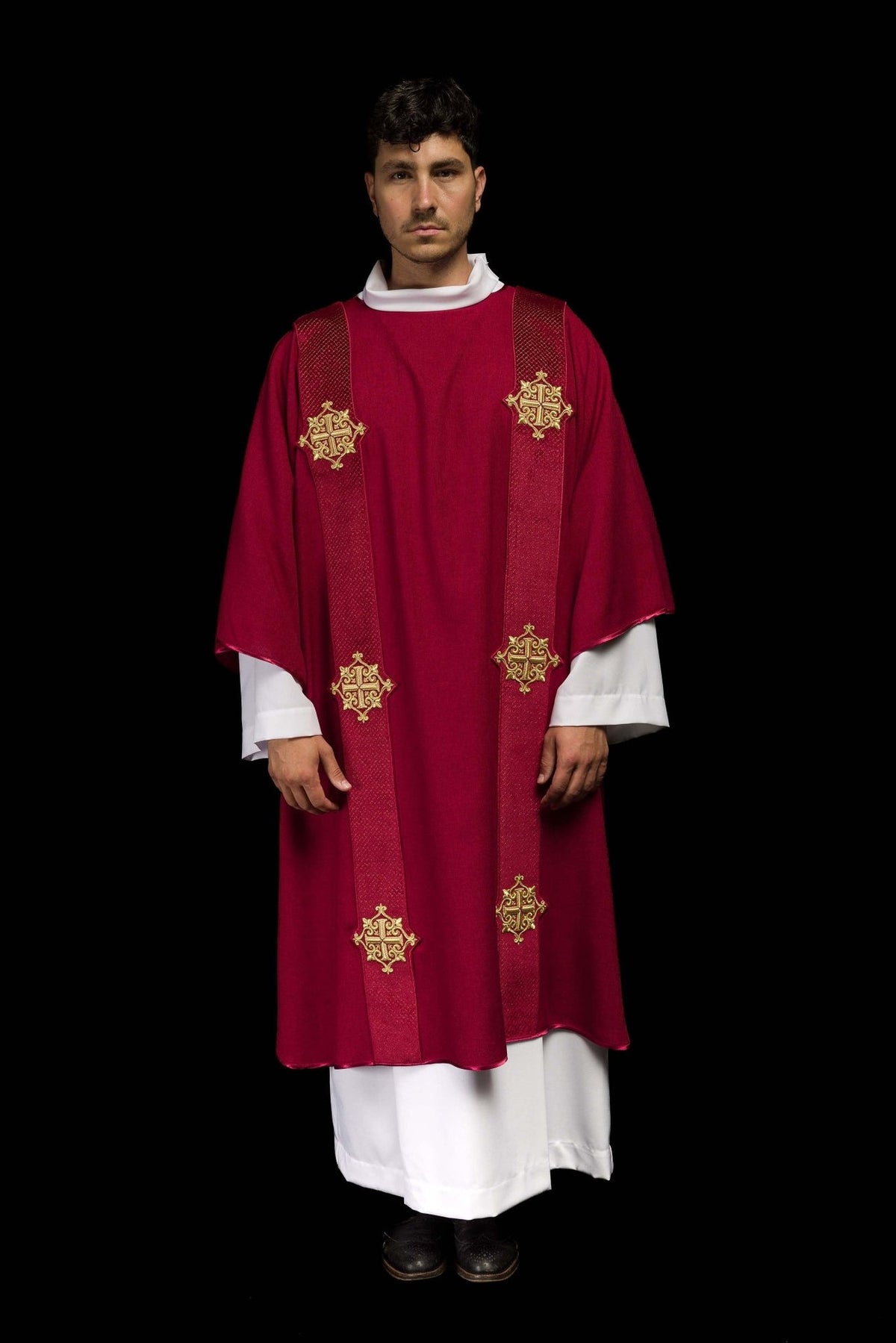 Red dalmatic front view with velvet orphrey and four gold embroidered crosses