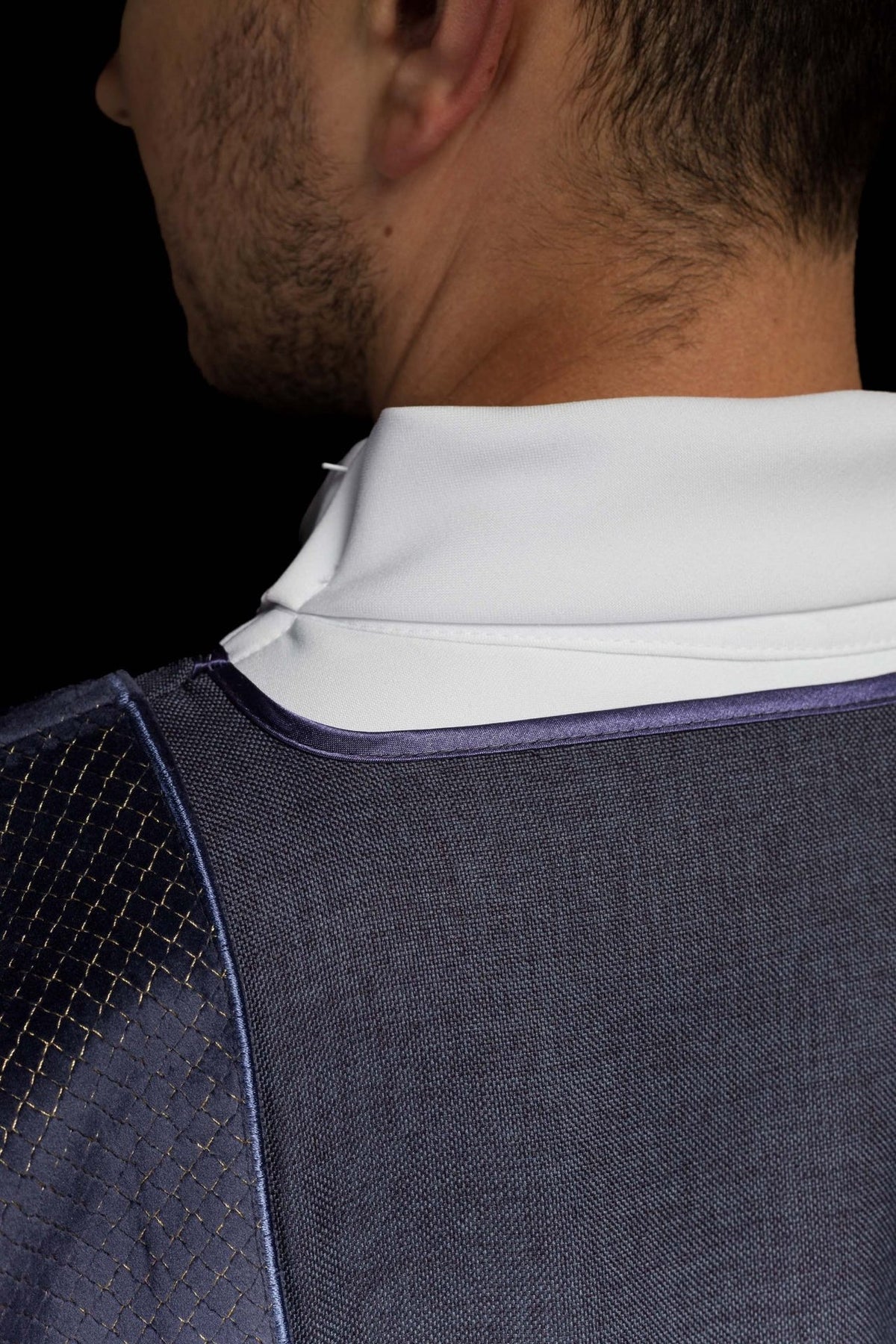 Purple velvet dalmatic upper front close-up with stand-up collar and embroidered cross