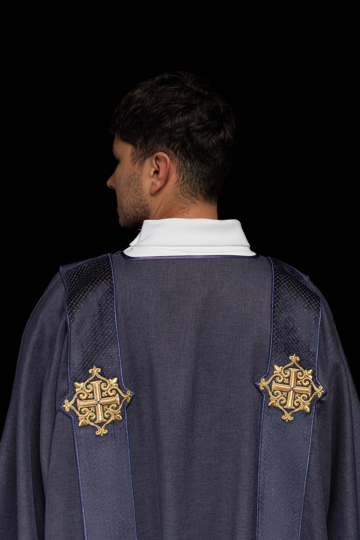 Purple velvet dalmatic back close-up with stand-up collar and orphreys