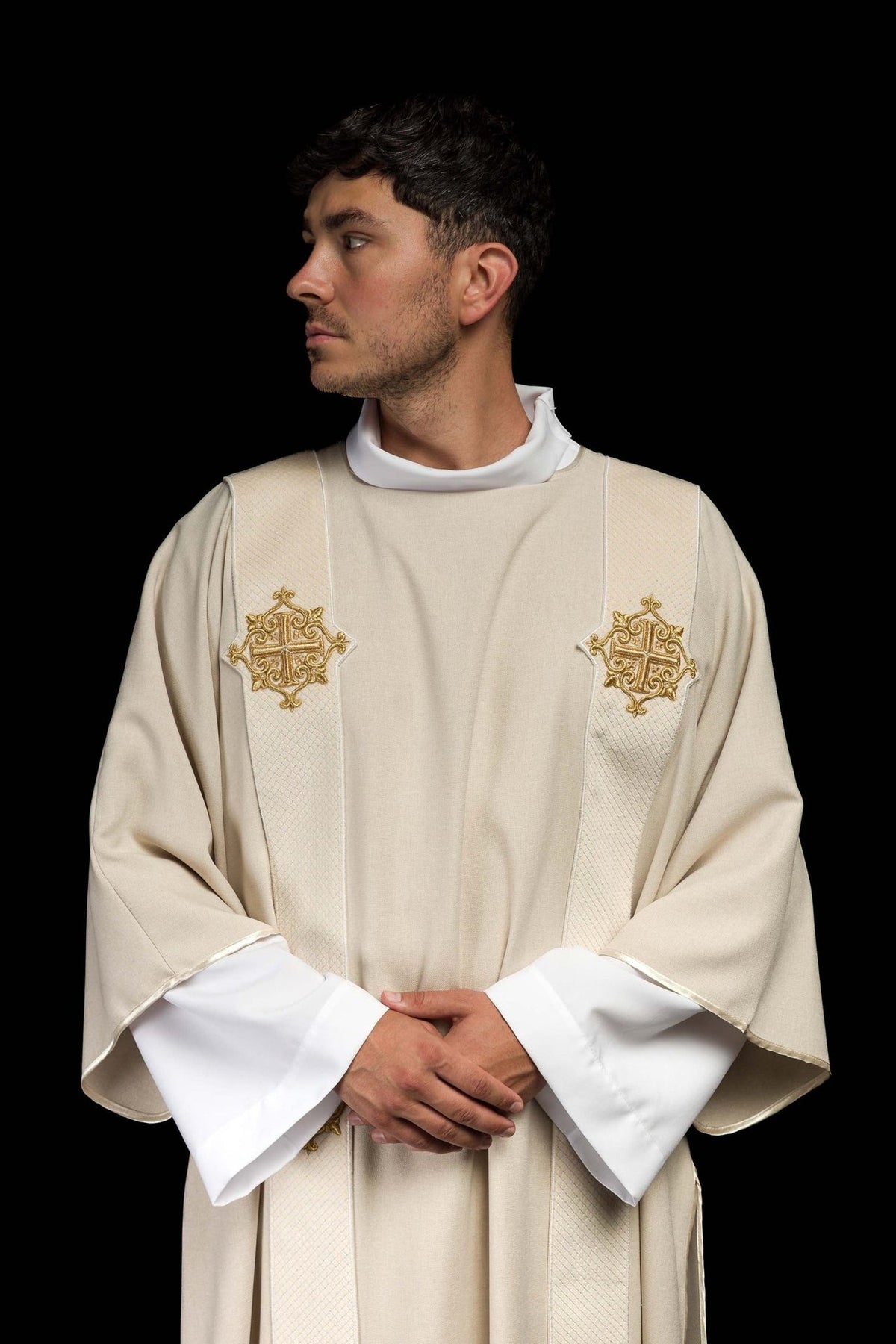 Ecru dalmatic upper front view with gold embroidered crosses and orphreys