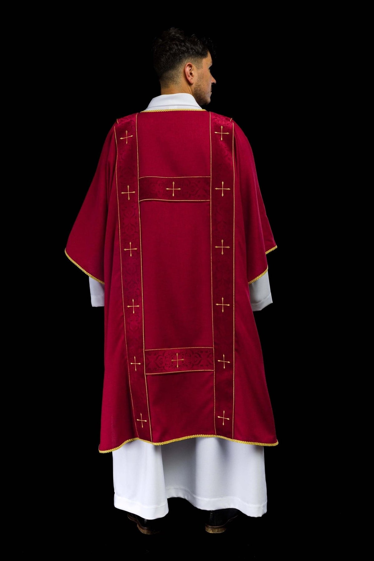 Red dalmatic full back view with gold cross embroidery