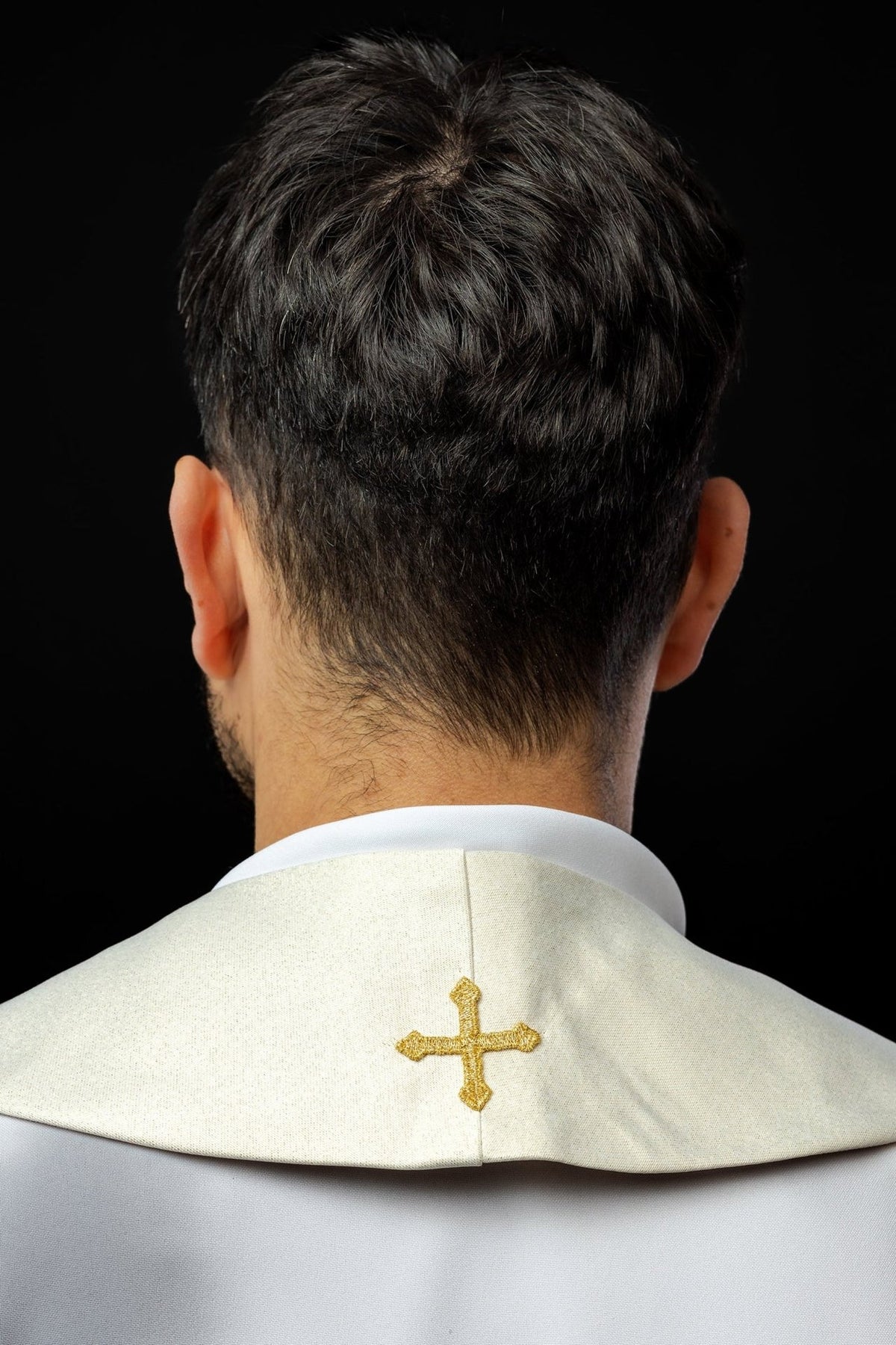 Gold priest stole back view showing a small embroidered cross at the collar