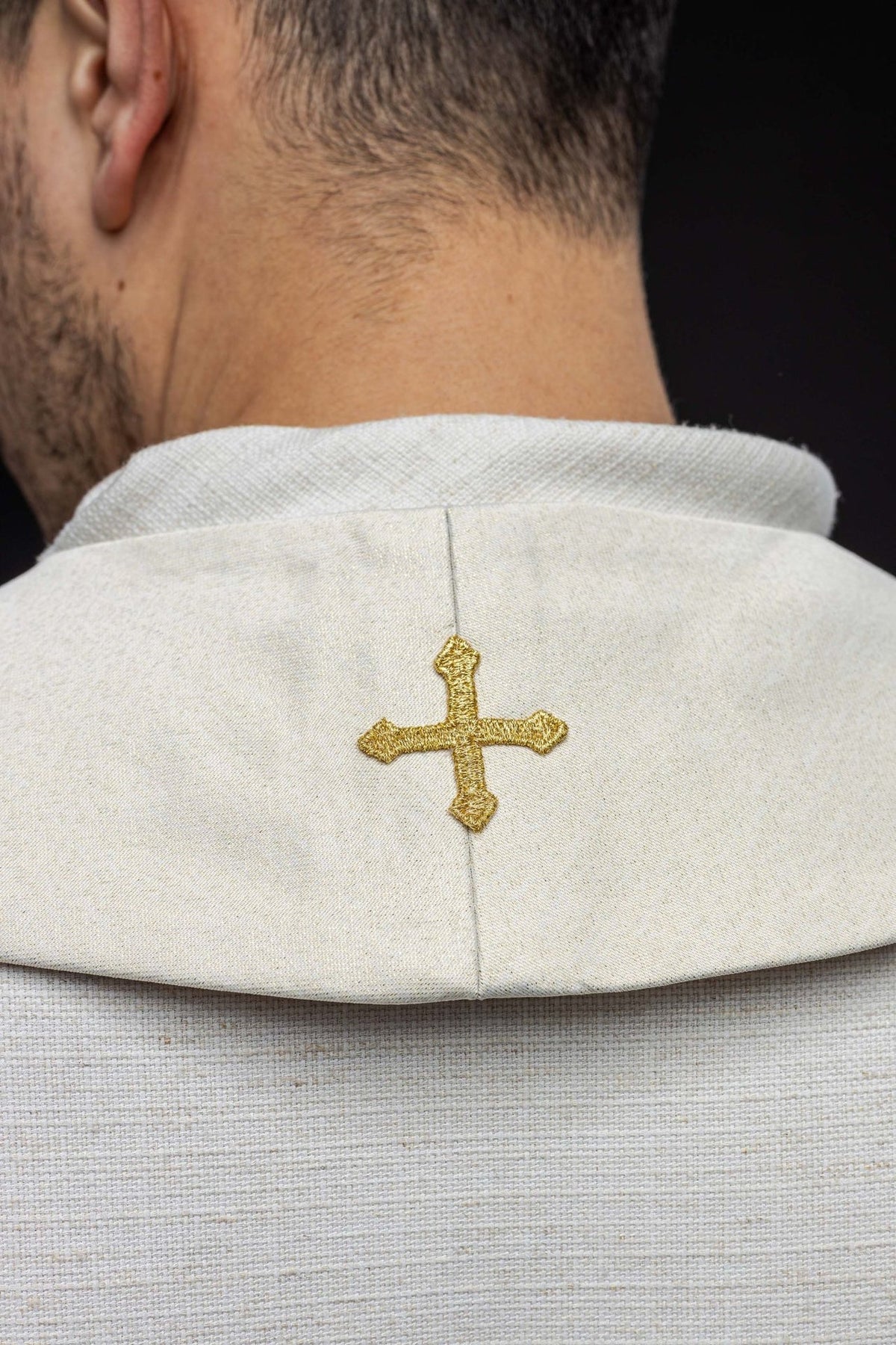 Priest stole back close-up with a small gold embroidered cross