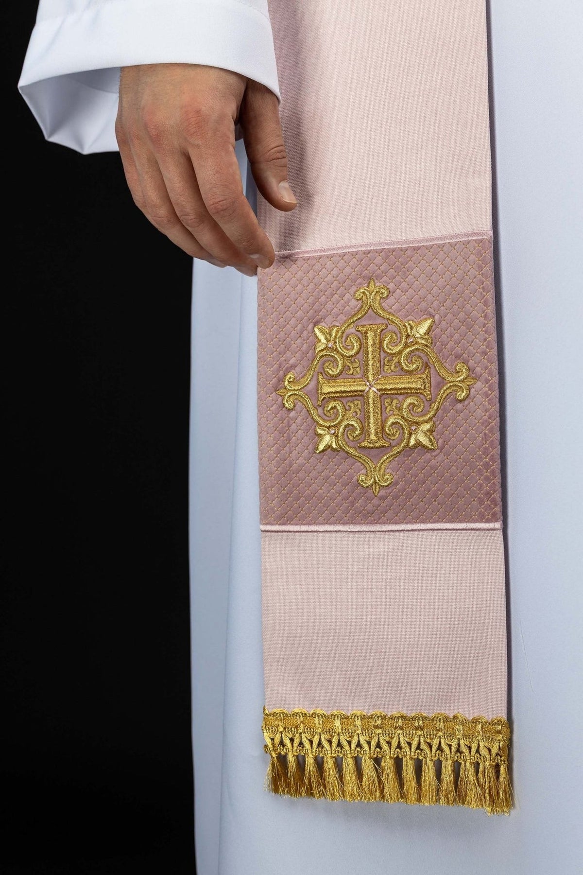 Rose velvet priest stole close-up with embroidered gold cross and gold fringe