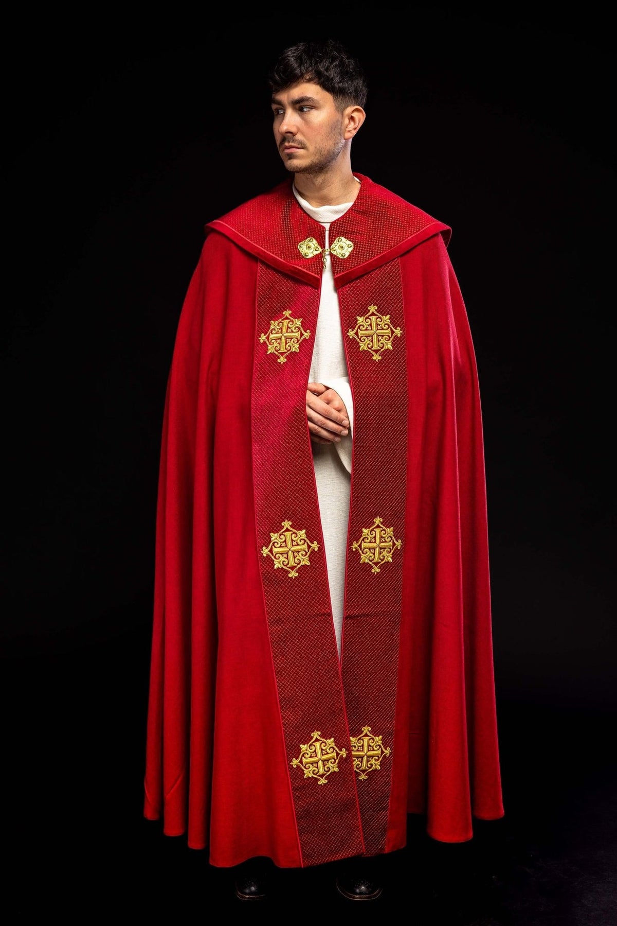 Red velvet cope front view with embroidered cross motifs on the orphrey