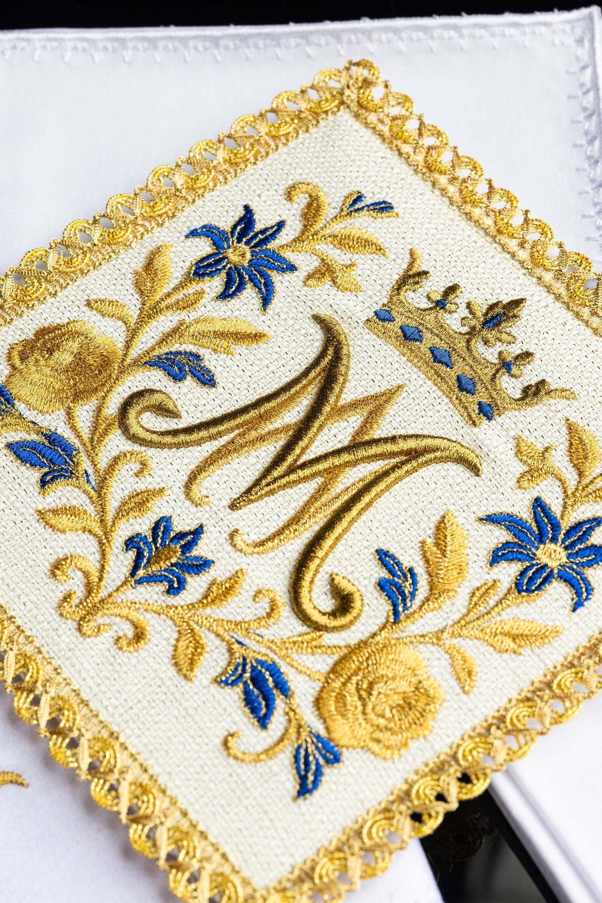 Altar linen set close-up of Marian symbol, crown and floral embroidery