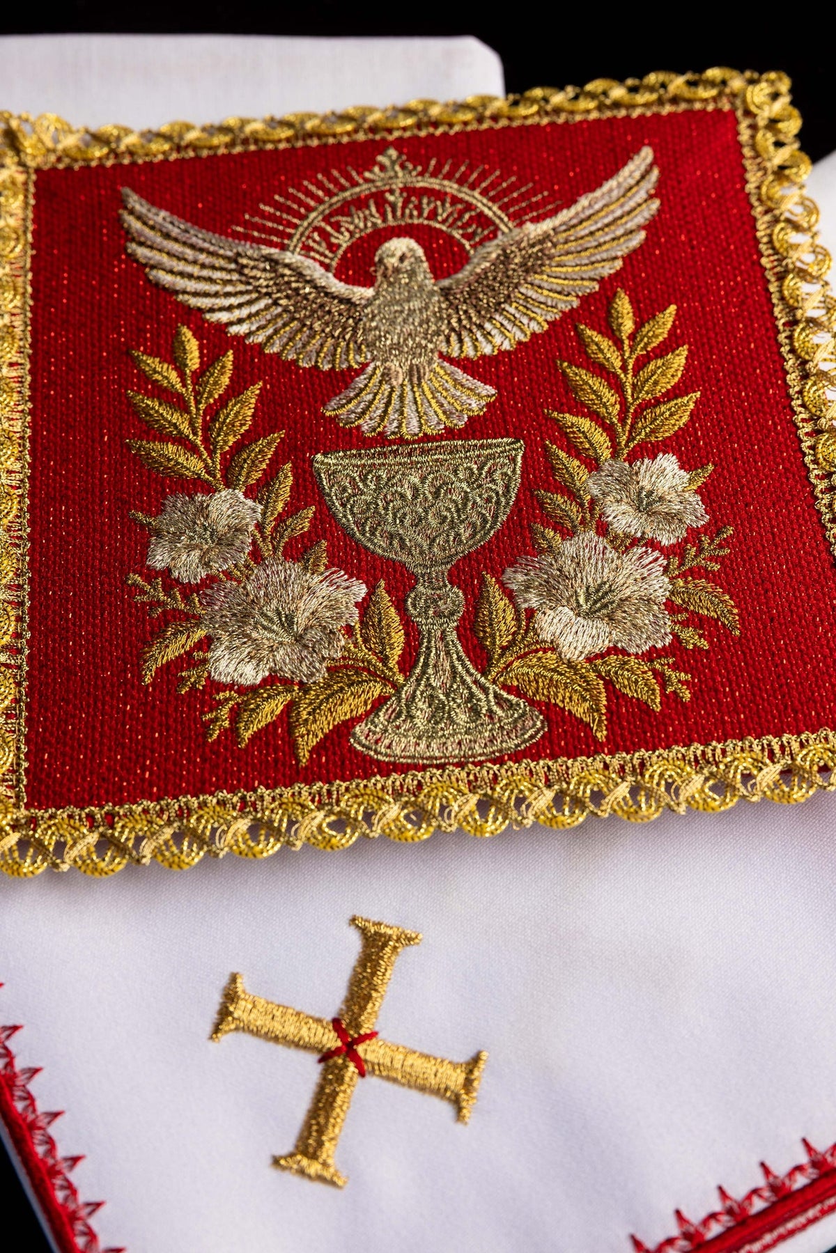 Altar linen set close-up with embroidered Holy Spirit, chalice, flowers, and gold trim