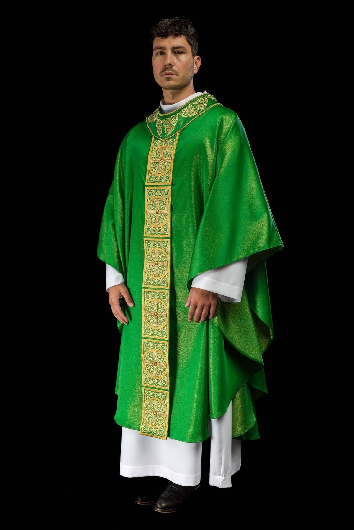 Green chasuble three-quarter view with embroidered orphrey and wide sleeves