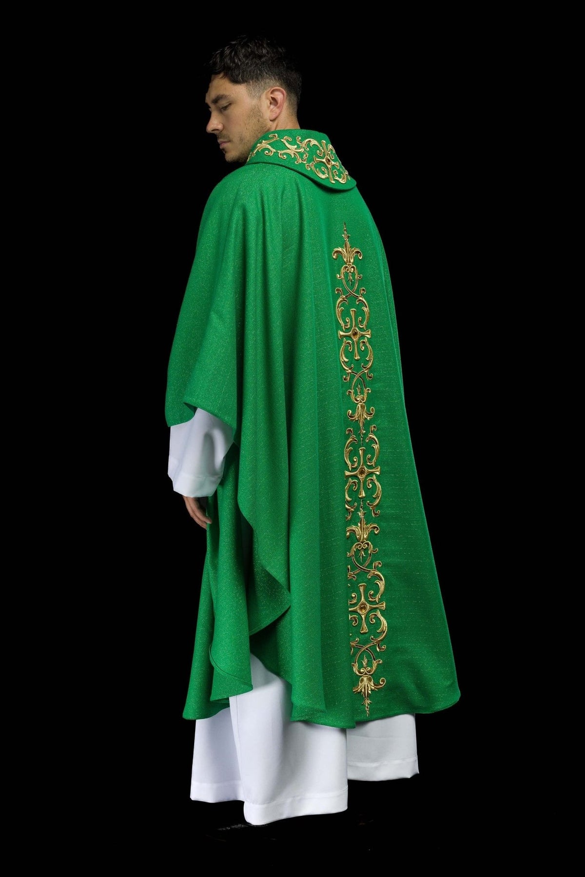 Green chasuble side back view with gold embroidery along the back