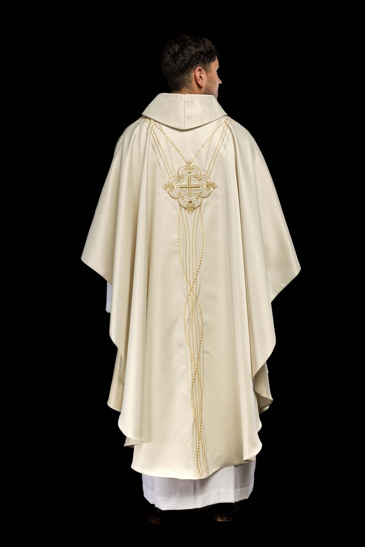 Ecru chasuble rear view showing wide drape and central rosary-inspired embroidery