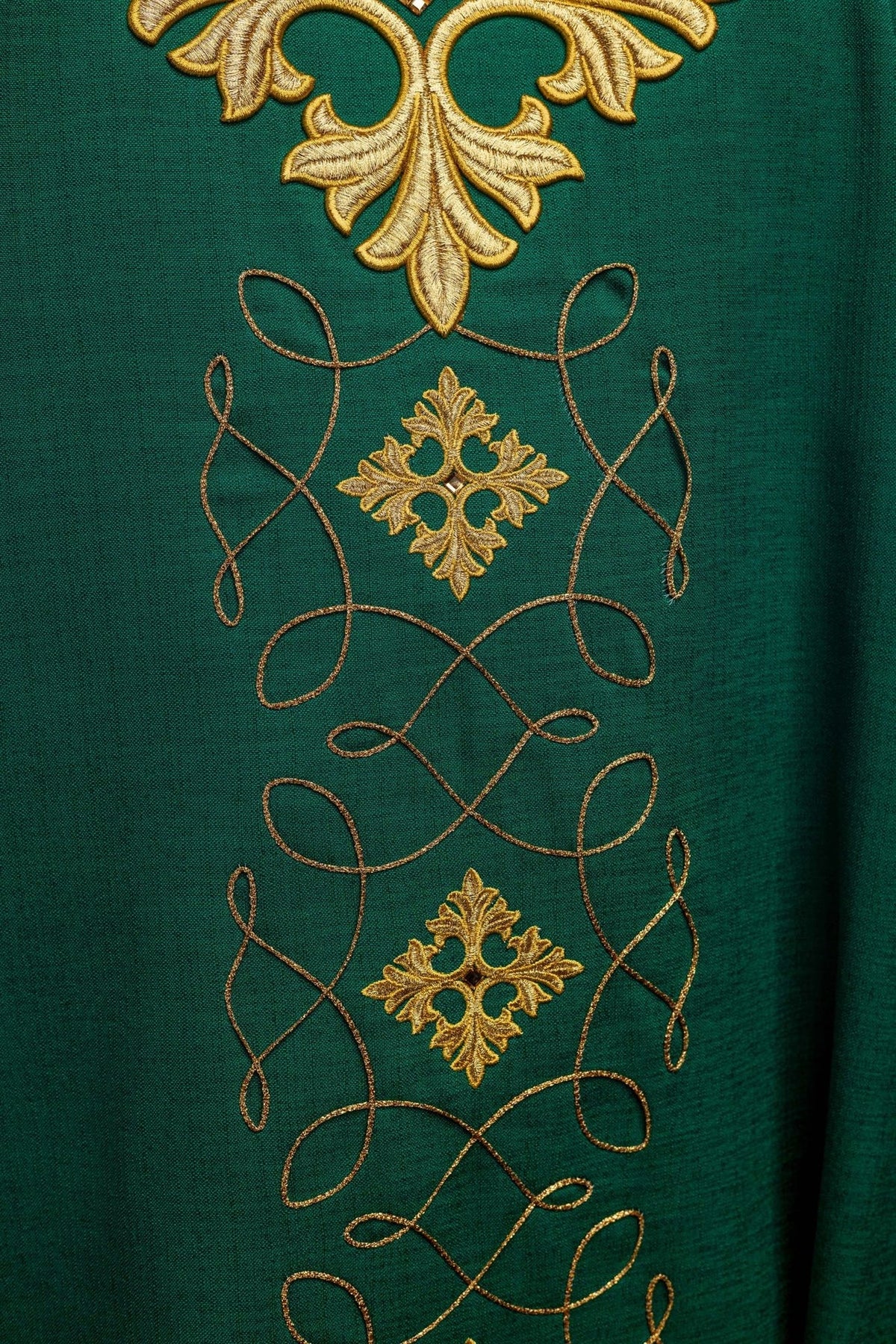 Green chasuble, close-up of embroidered gold cord and cross motifs