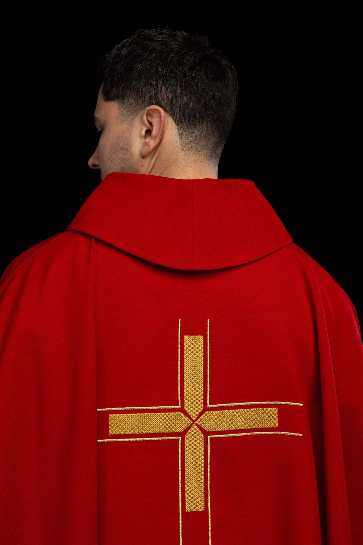 Red chasuble back view with gold cross embroidery