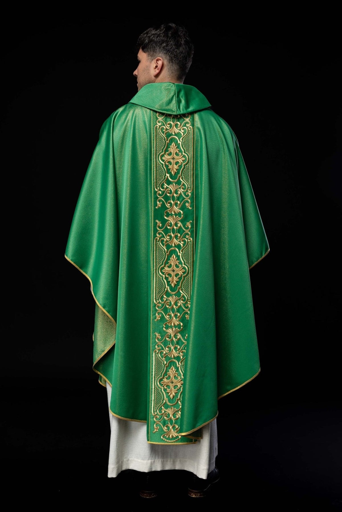 Green chasuble back view with a central gold embroidered panel and stand-up collar