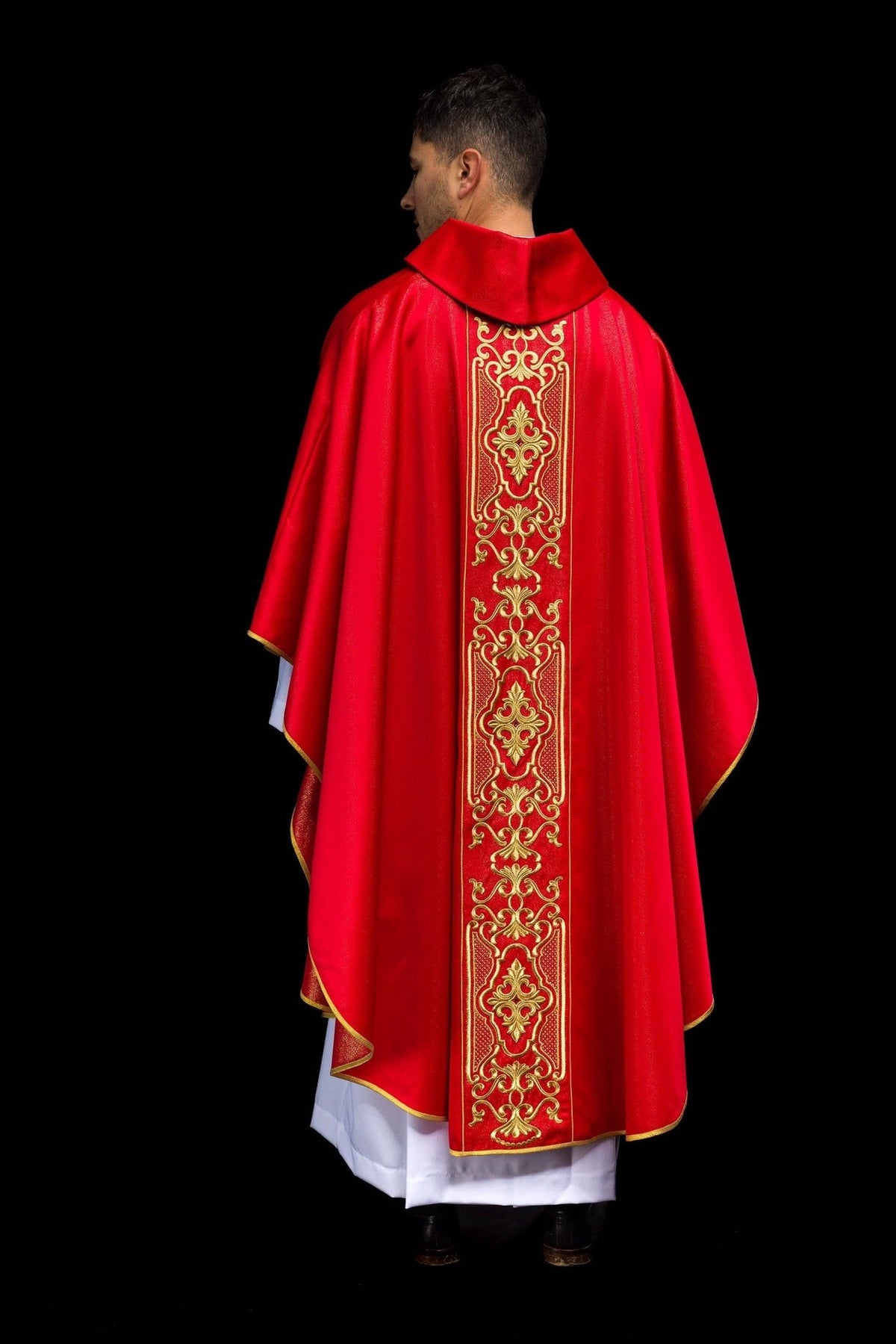 Red chasuble full back view with continuous gold embroidery and trim