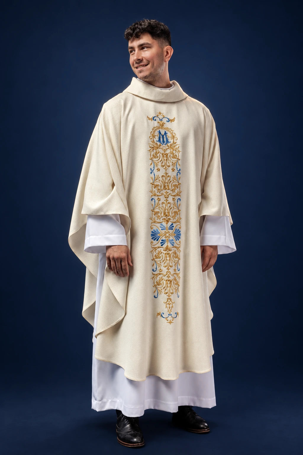 Chasuble in Shimmering Fabric with Gold Thread, front view in ivory with blue and gold embroidered panel