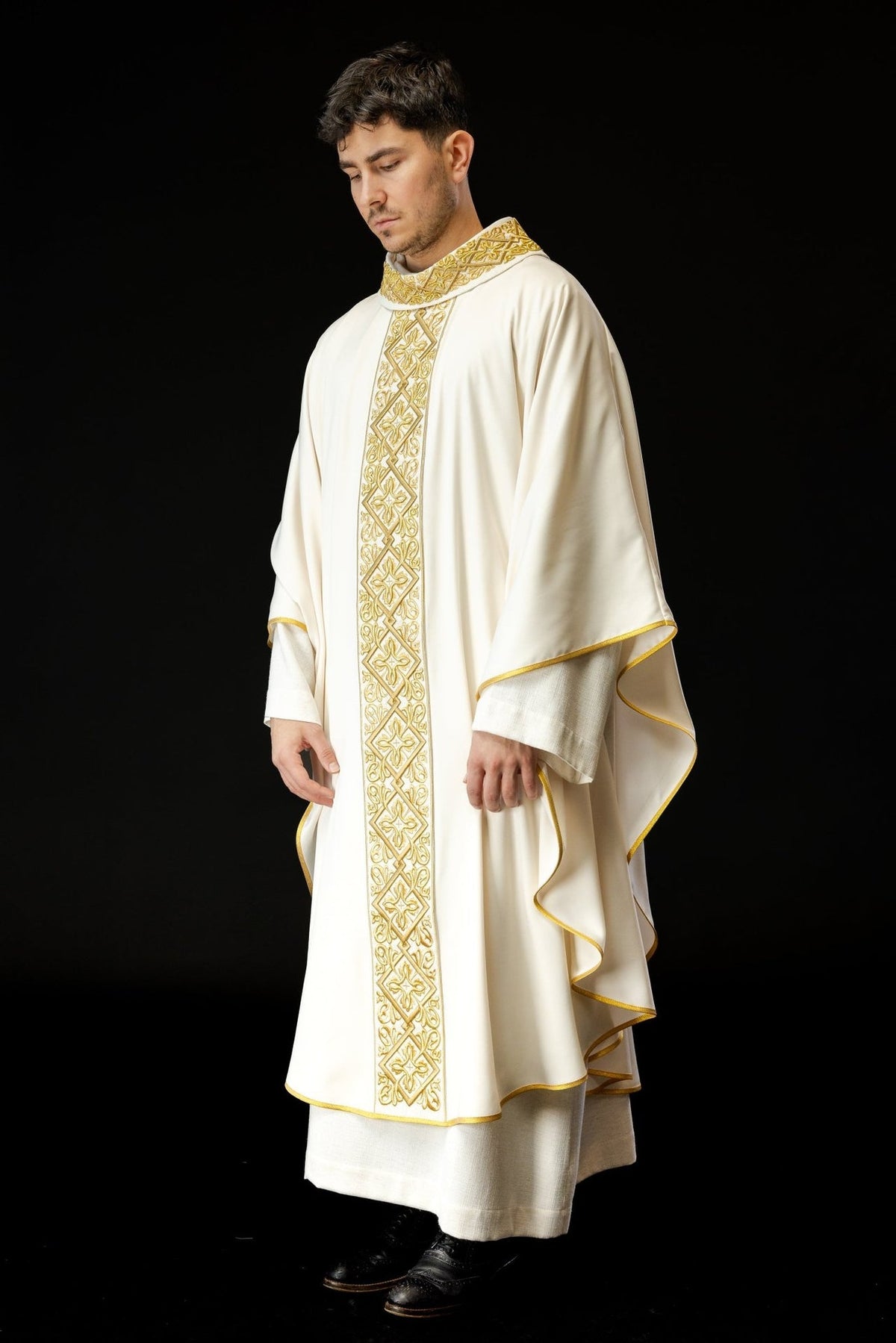 Ecru chasuble, full front view with gold embroidered trim and crosses