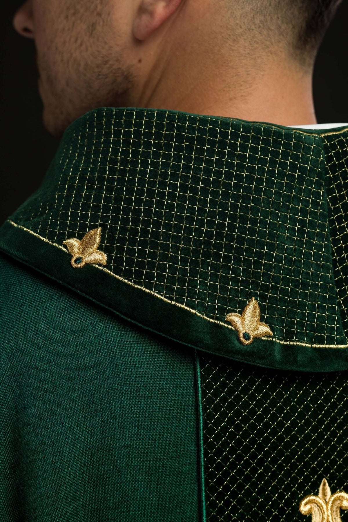 Green velvet chasuble back close-up with diamond embroidery and gold trim