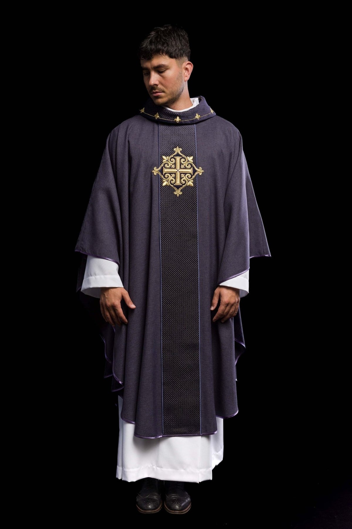 Velvet chasuble, full front view with embroidered cross and purple trim