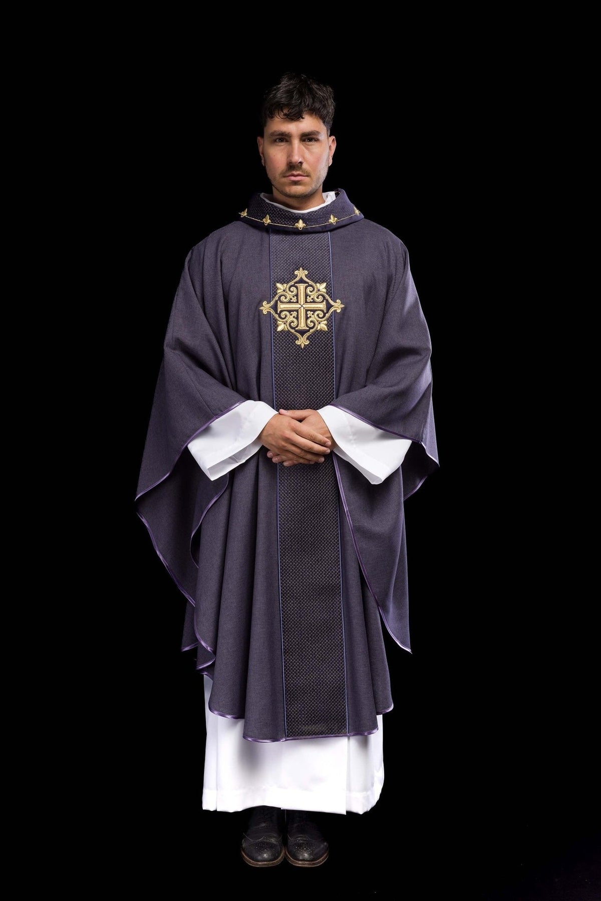 Velvet chasuble, front worn view with purple trim and embroidered cross