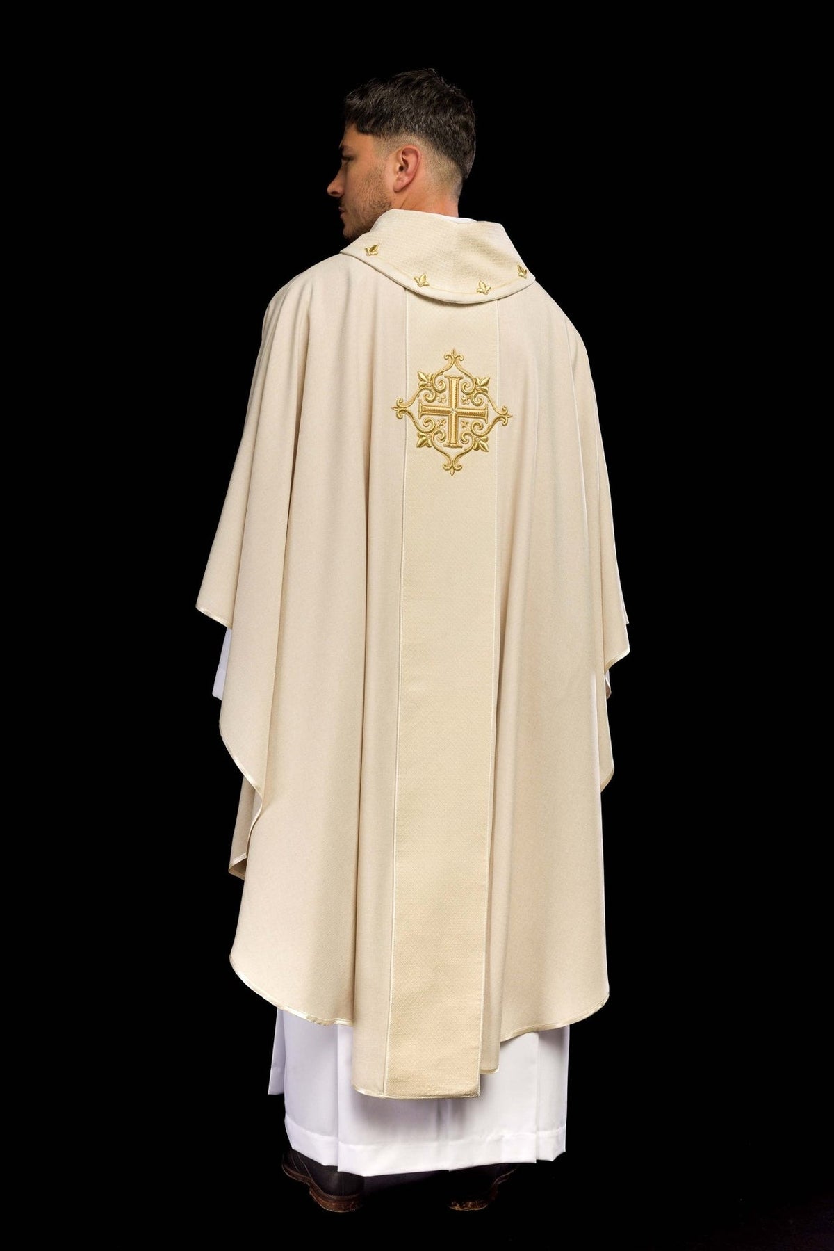 Ecru chasuble back view with central gold cross embroidery and quilted collar