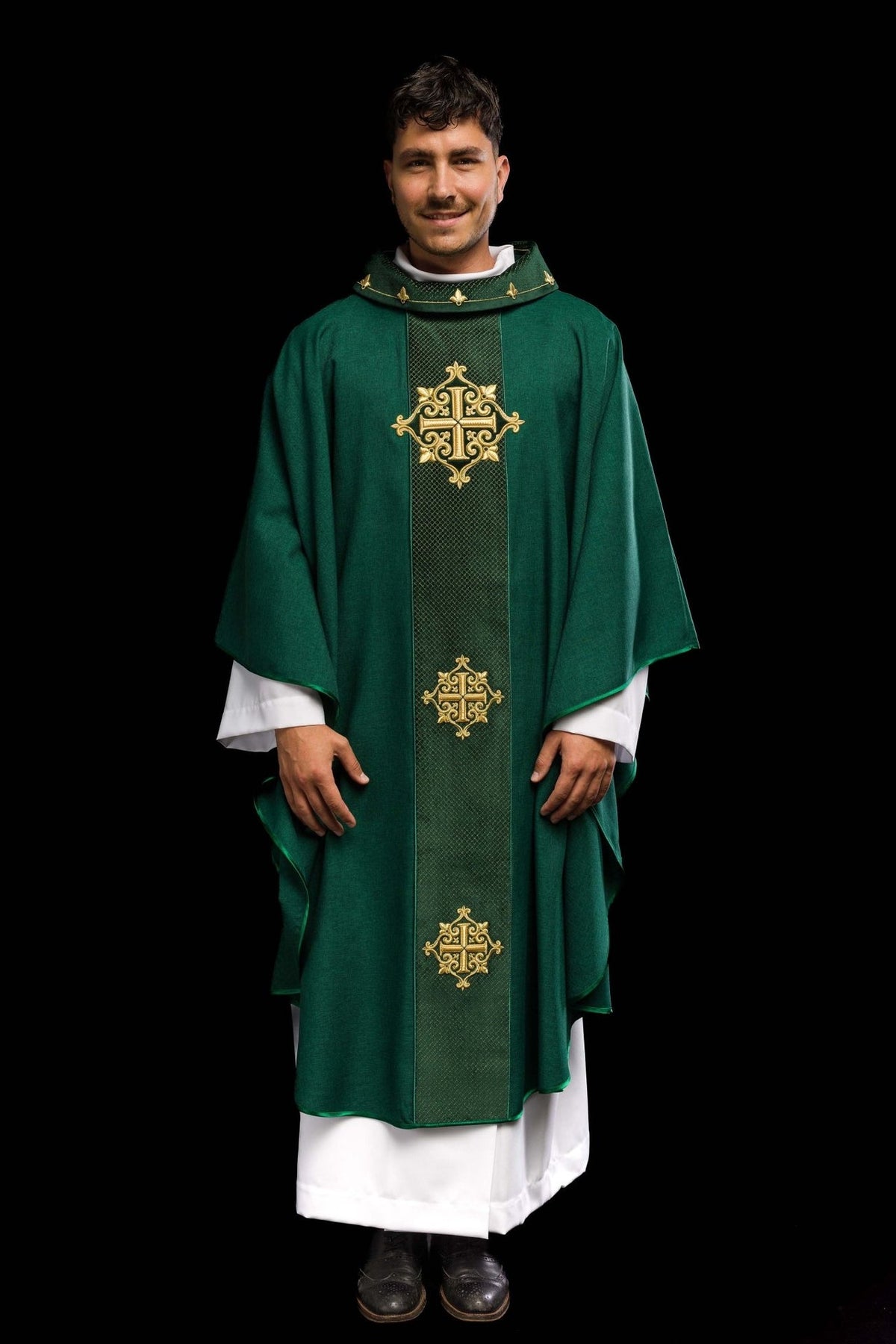 Green chasuble front view with velvet orphrey and three gold cross embroidery motifs
