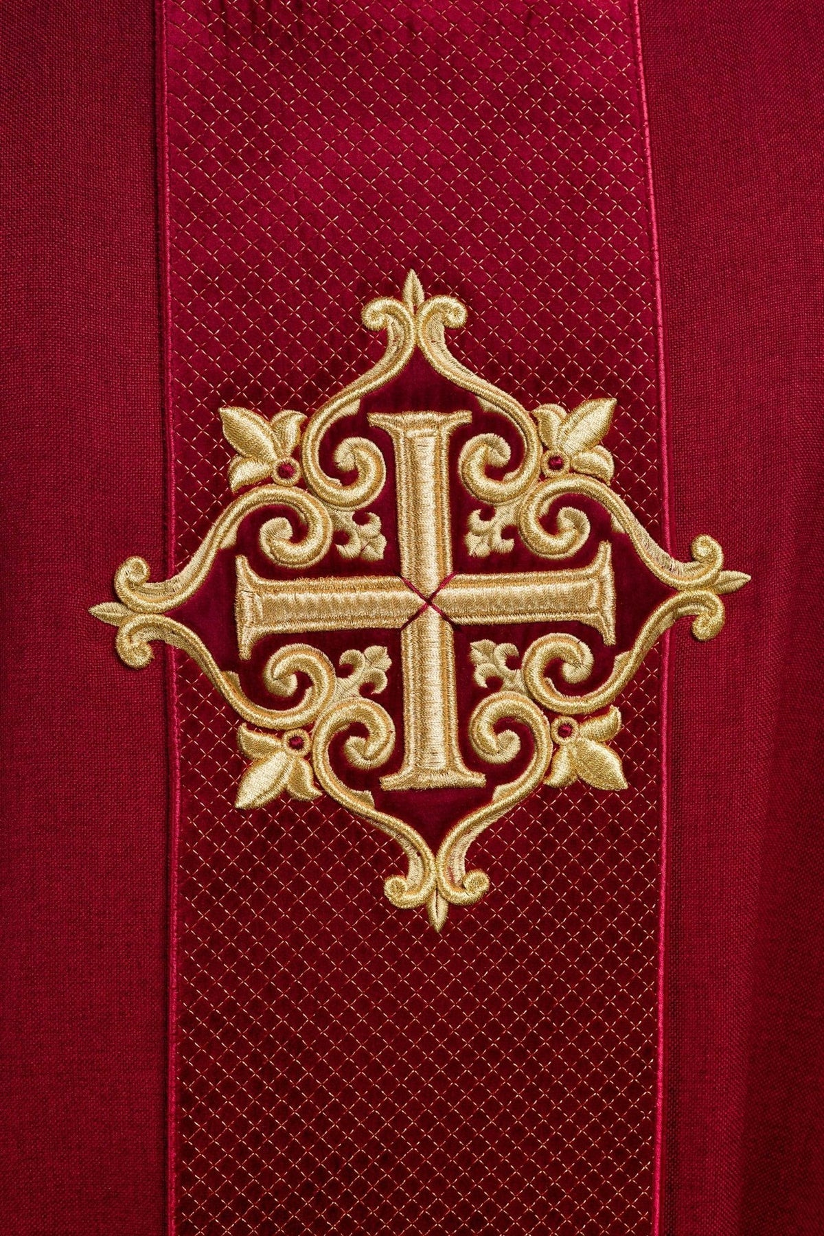 Red velvet chasuble, close-up of gold cross embroidery on the orphrey