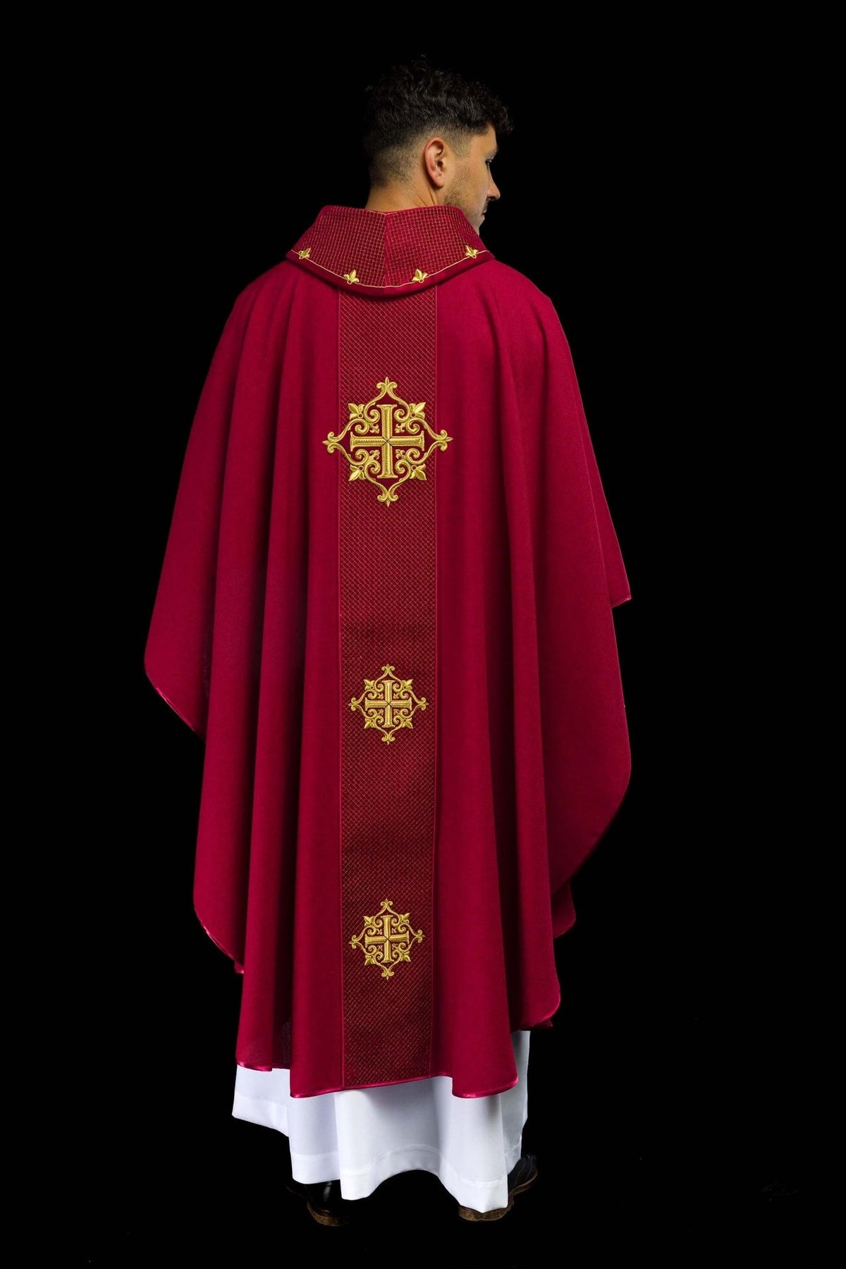 Red velvet chasuble, back view with gold cross embroidery on the orphrey