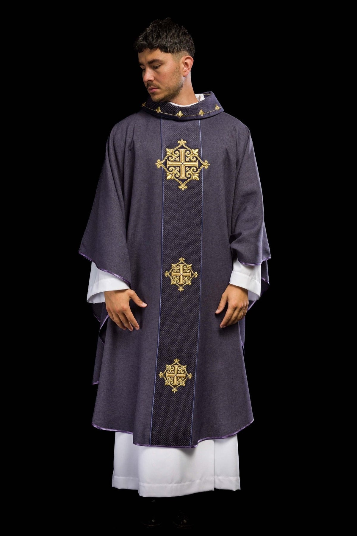 Purple velvet chasuble front view with cross embroidery and trimmed edges