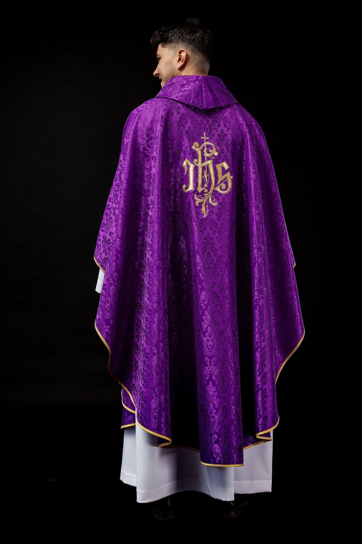 Purple chasuble full back view with patterned fabric and gold trim