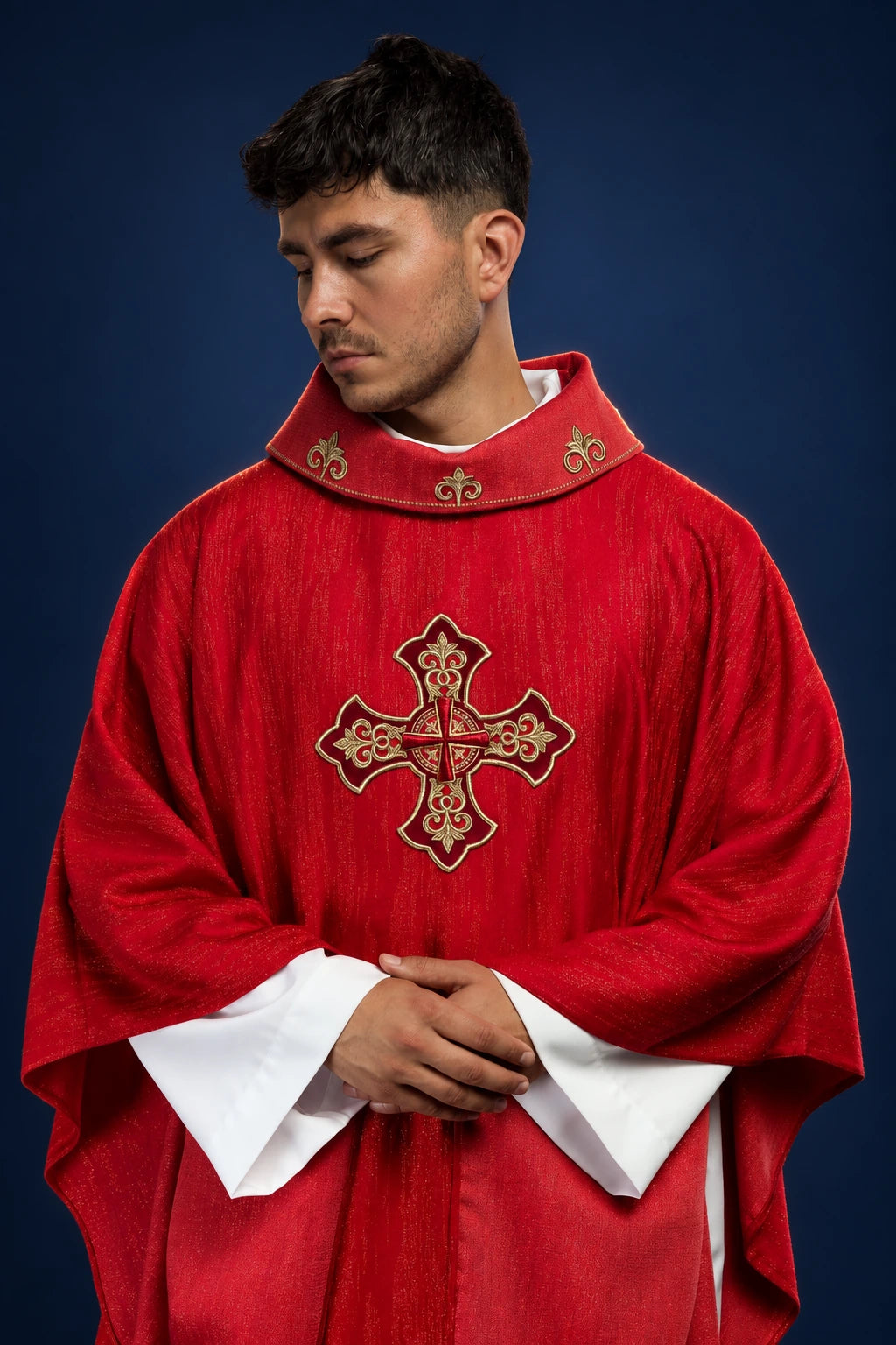 Red Chasuble with Embroidered Cross Motif on Decorative Fabric, front view with gold embroidery