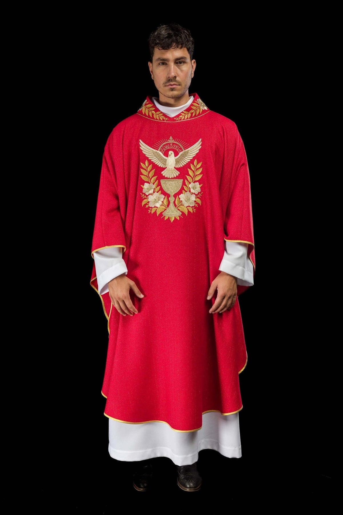Red chasuble front view with embroidered Holy Spirit and gold-trimmed edges