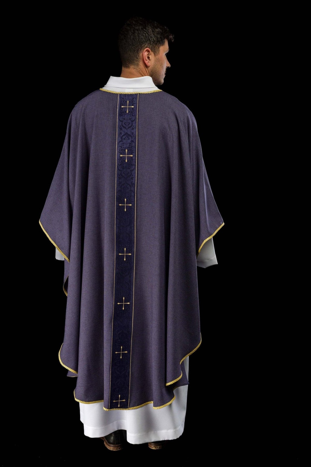 Purple chasuble full back view with gold trim and cross orphrey