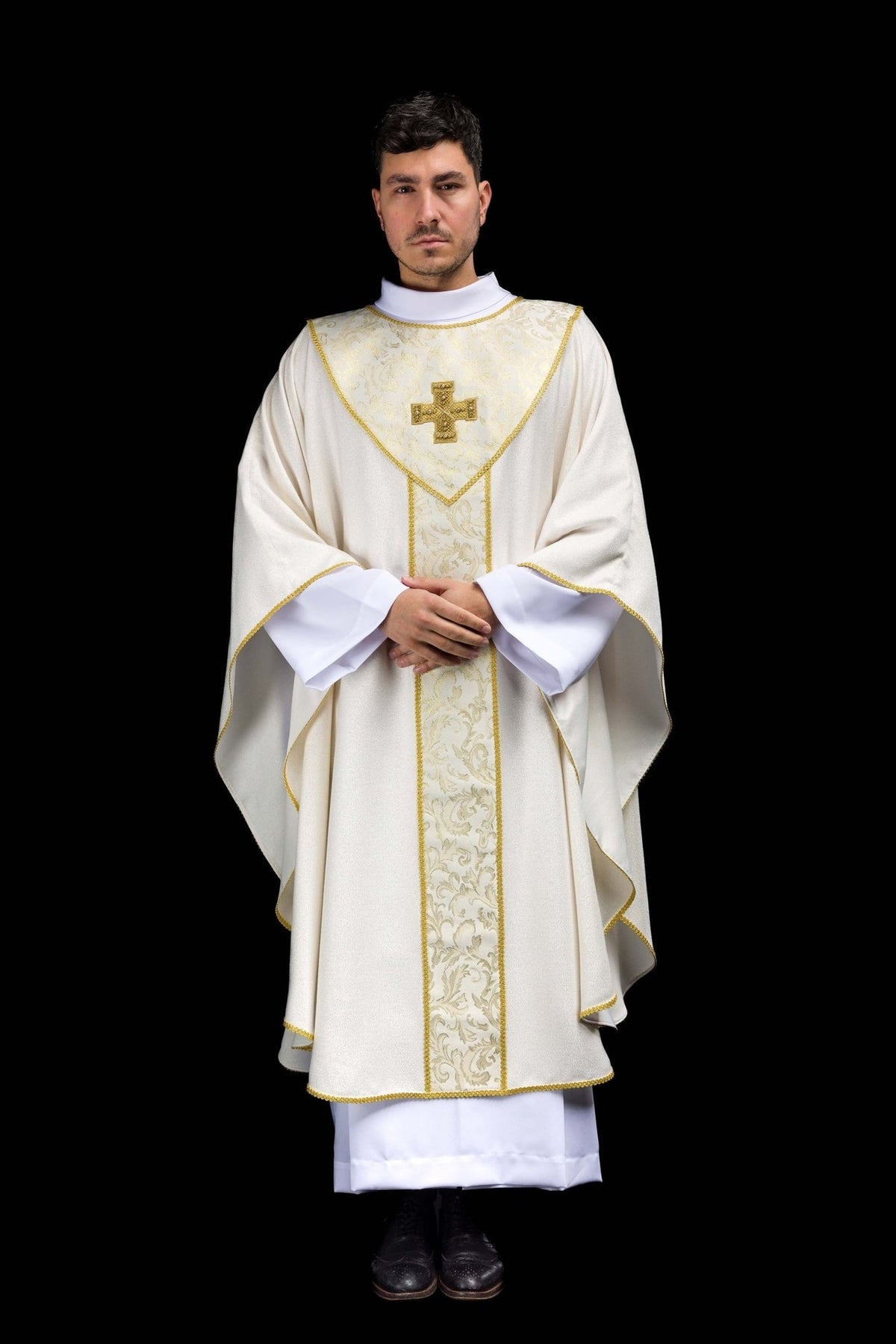 Ecru chasuble front view with gold cross and patterned jacquard orphrey