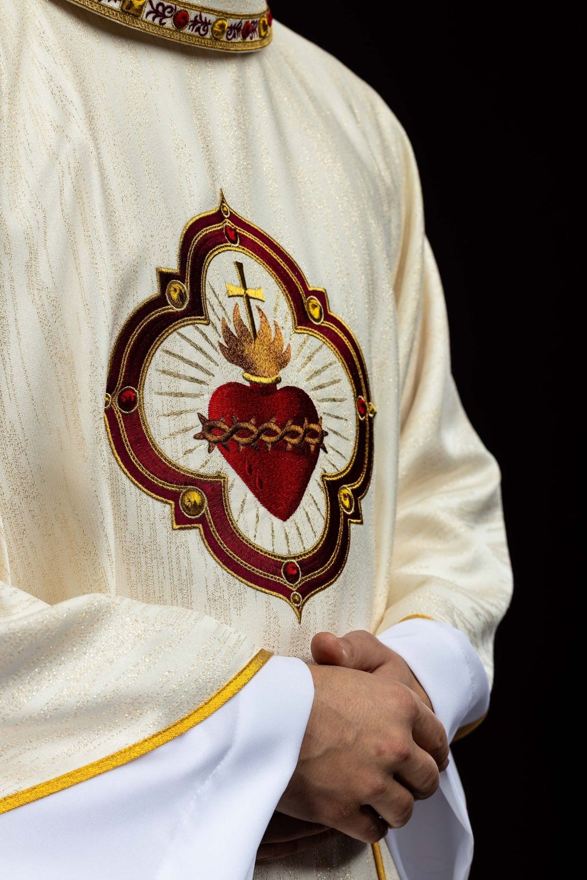 Chasuble angled front view with Sacred Heart of Jesus embroidery and gold trim