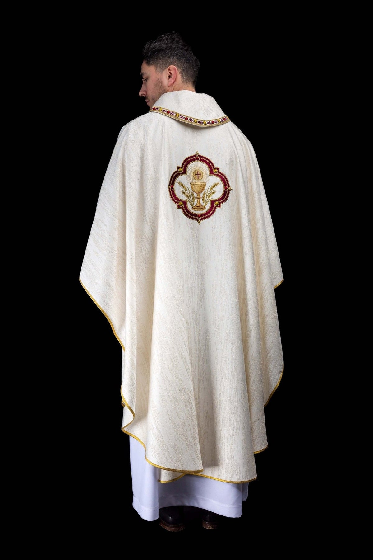 Chasuble full back view with cream fabric, gold trim and communion chalice embroidery