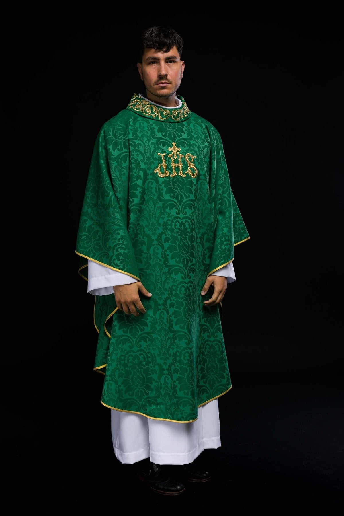 Green chasuble front view with gold IHS embroidery and floral satin pattern