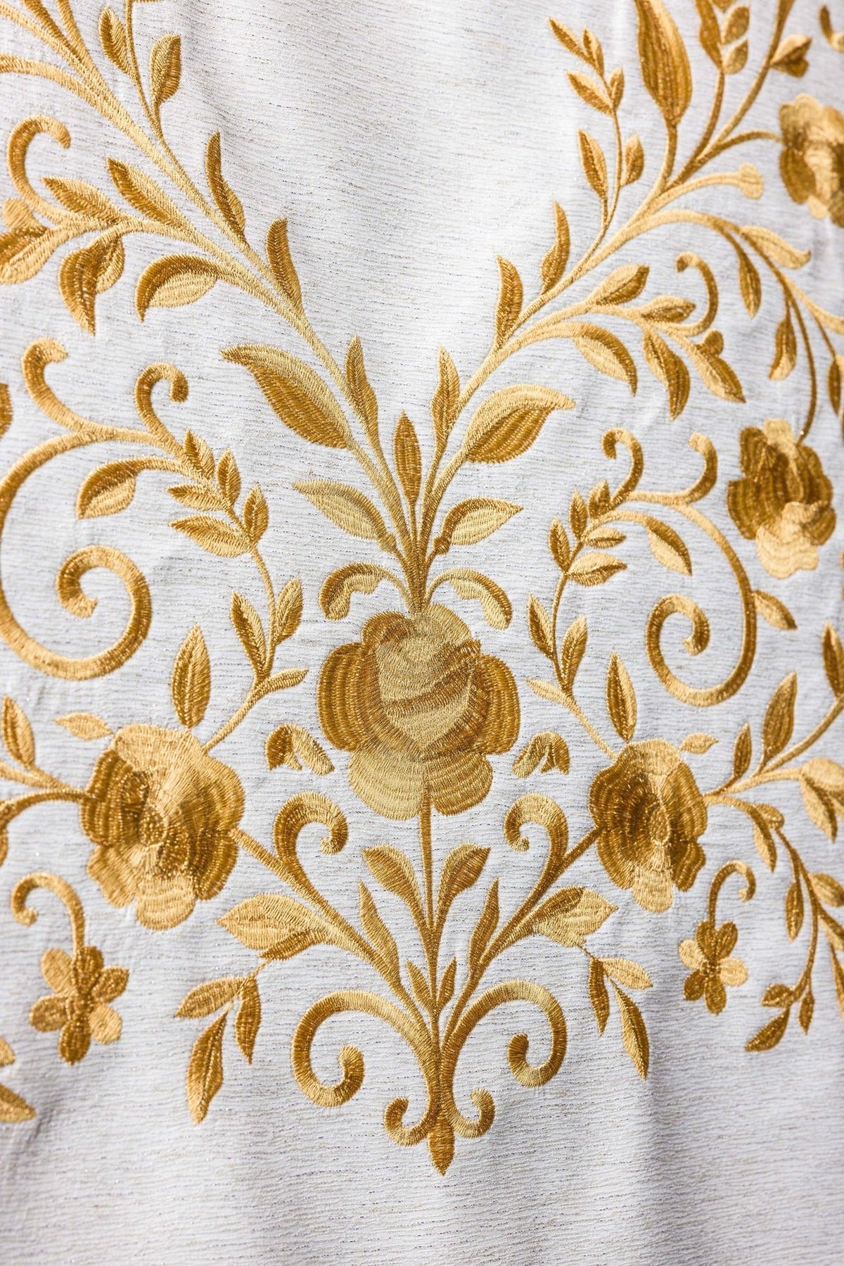Church lectern cover close-up of gold floral embroidery