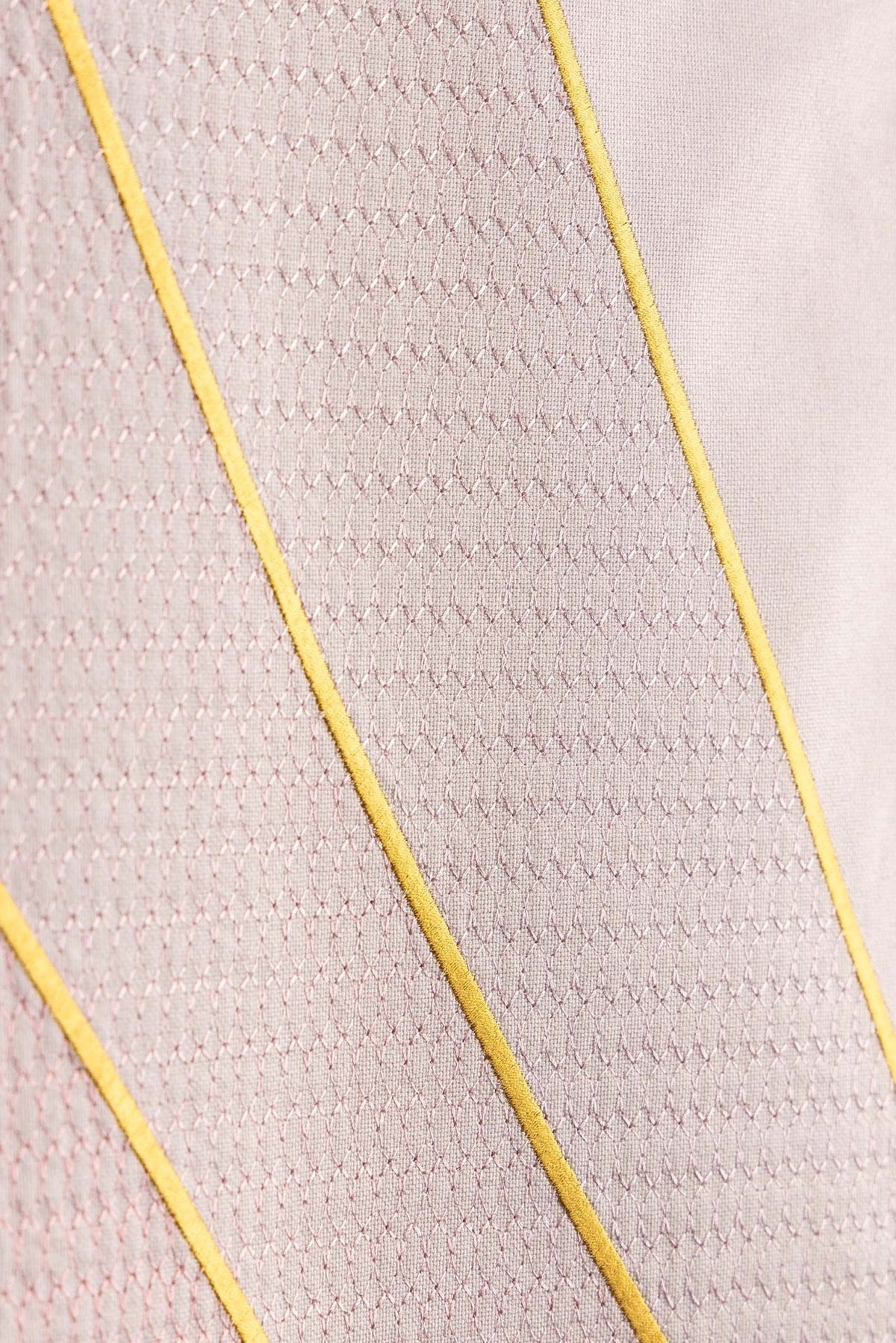 Church lectern cover close-up of gold wheat embroidery and diagonal lines