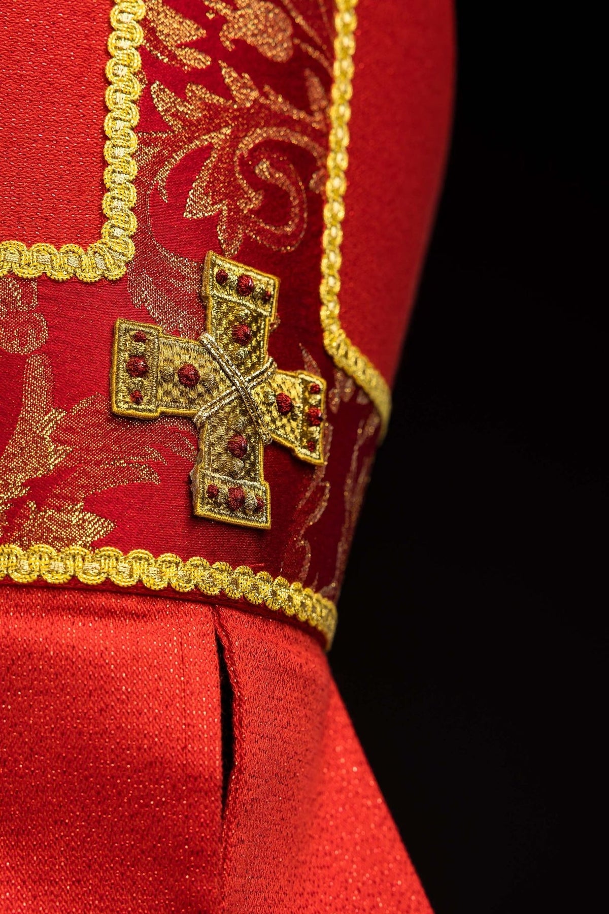Red miter side view with gold trim, jacquard band and red tail
