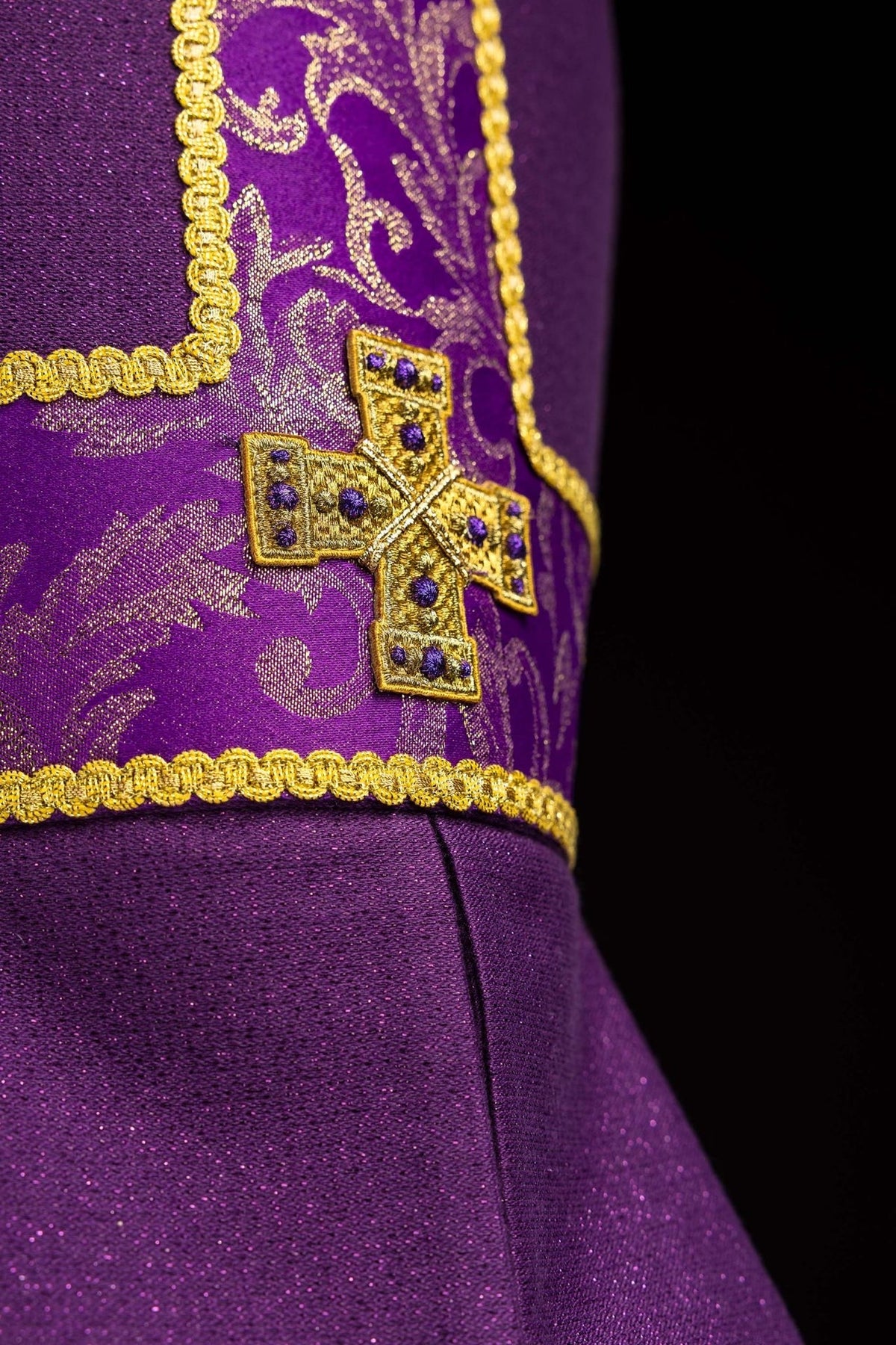Purple miter side view with gold embroidered cross and long back panels