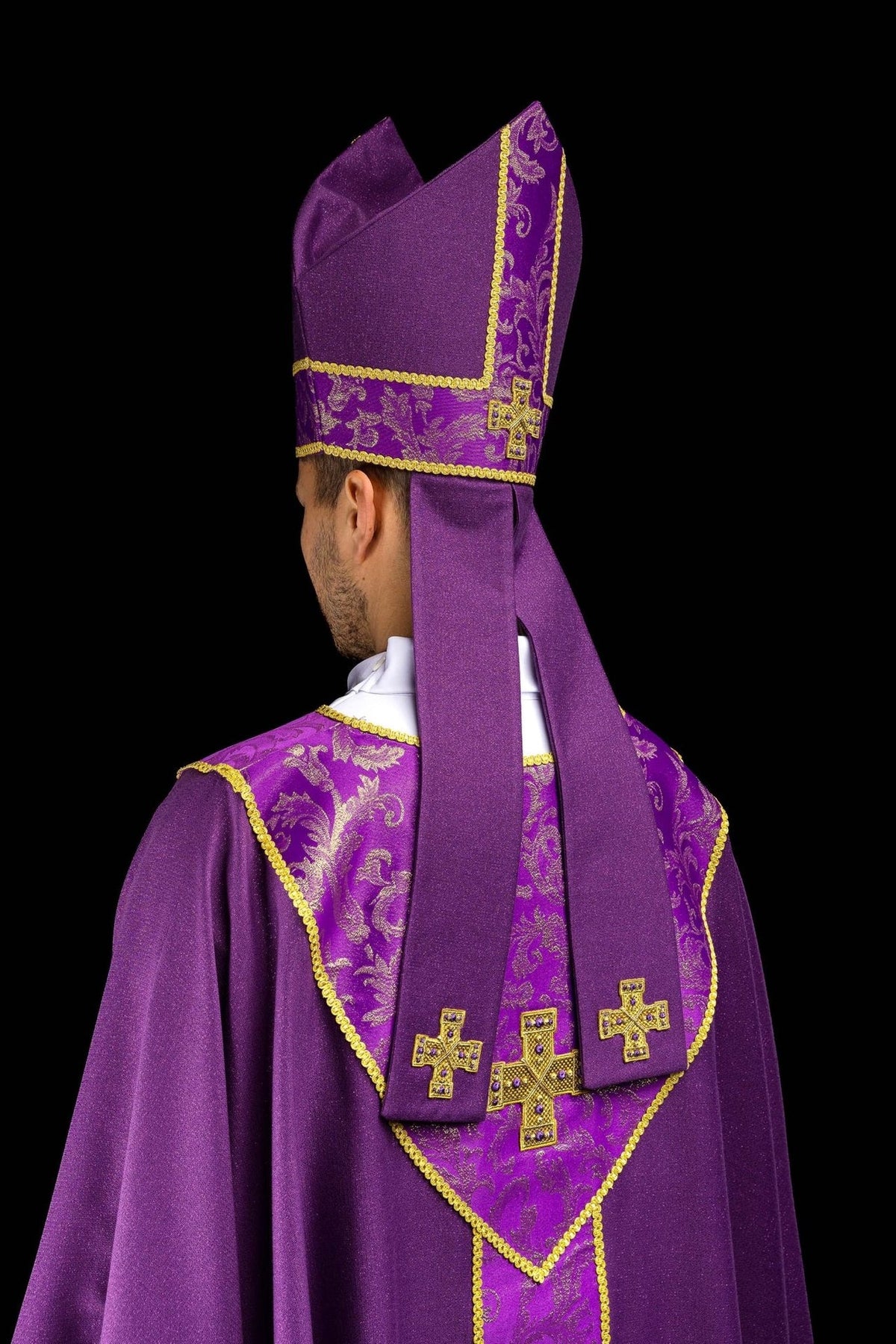Purple miter back-side view with jacquard panels and embroidered crosses