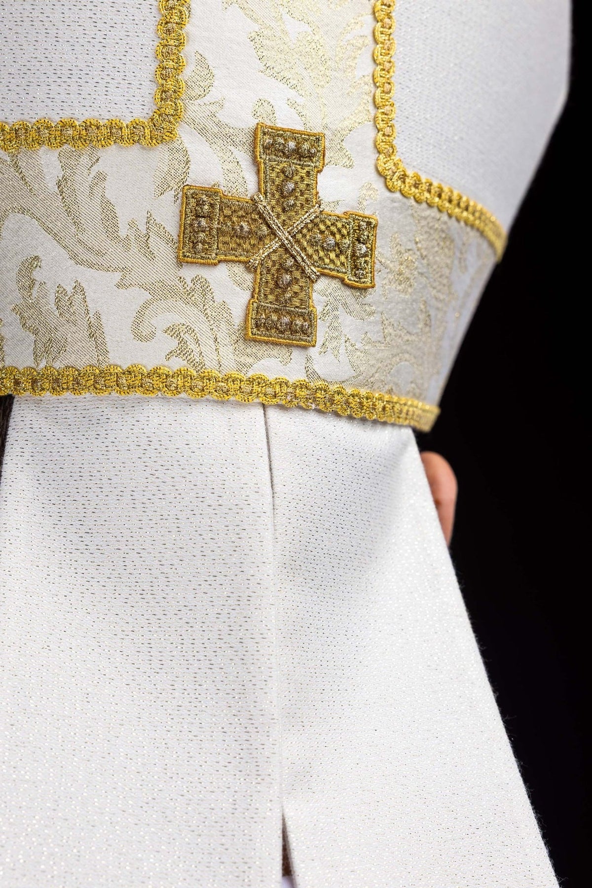 Ecru miter back view with embroidered cross and hanging fabric
