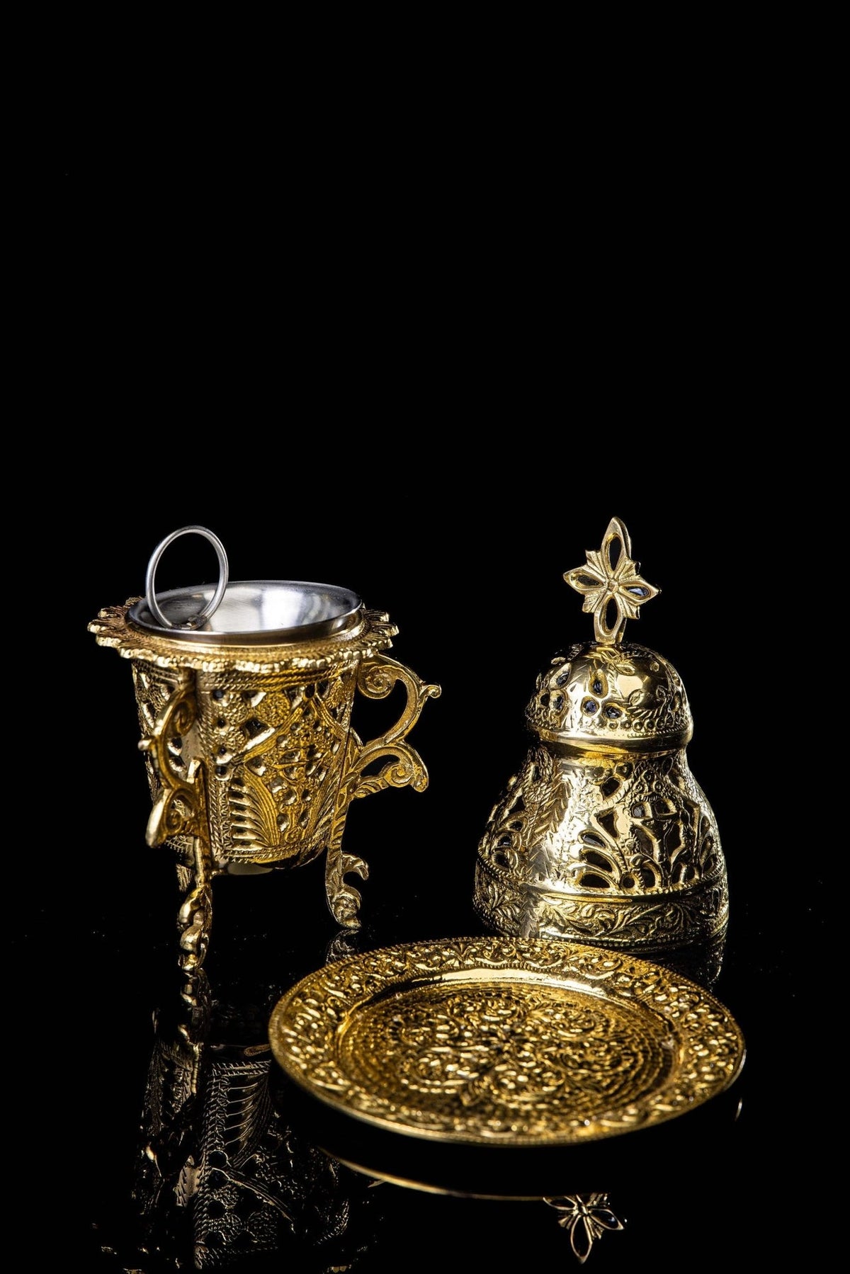 Gold censer with cross, stand and embossed floral plate shown together