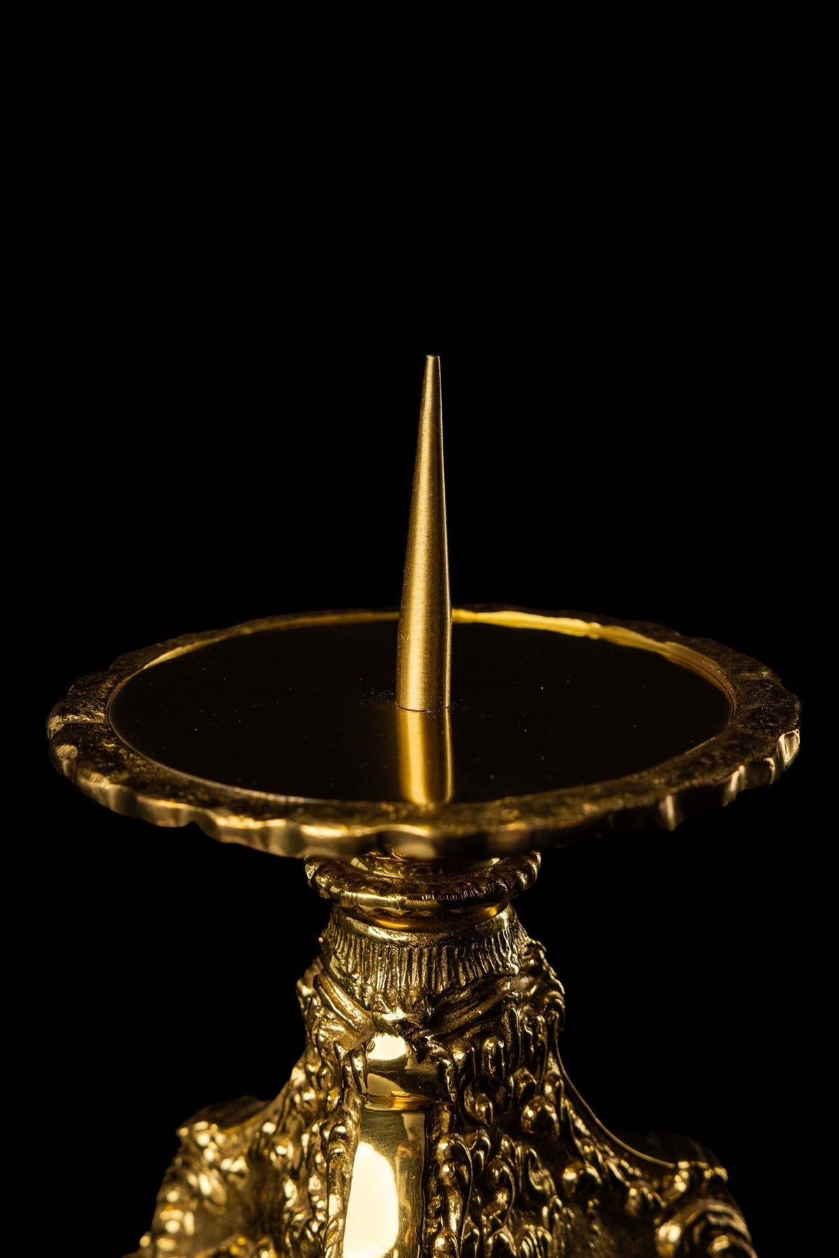 Mosiężny lichtarz liturgiczny