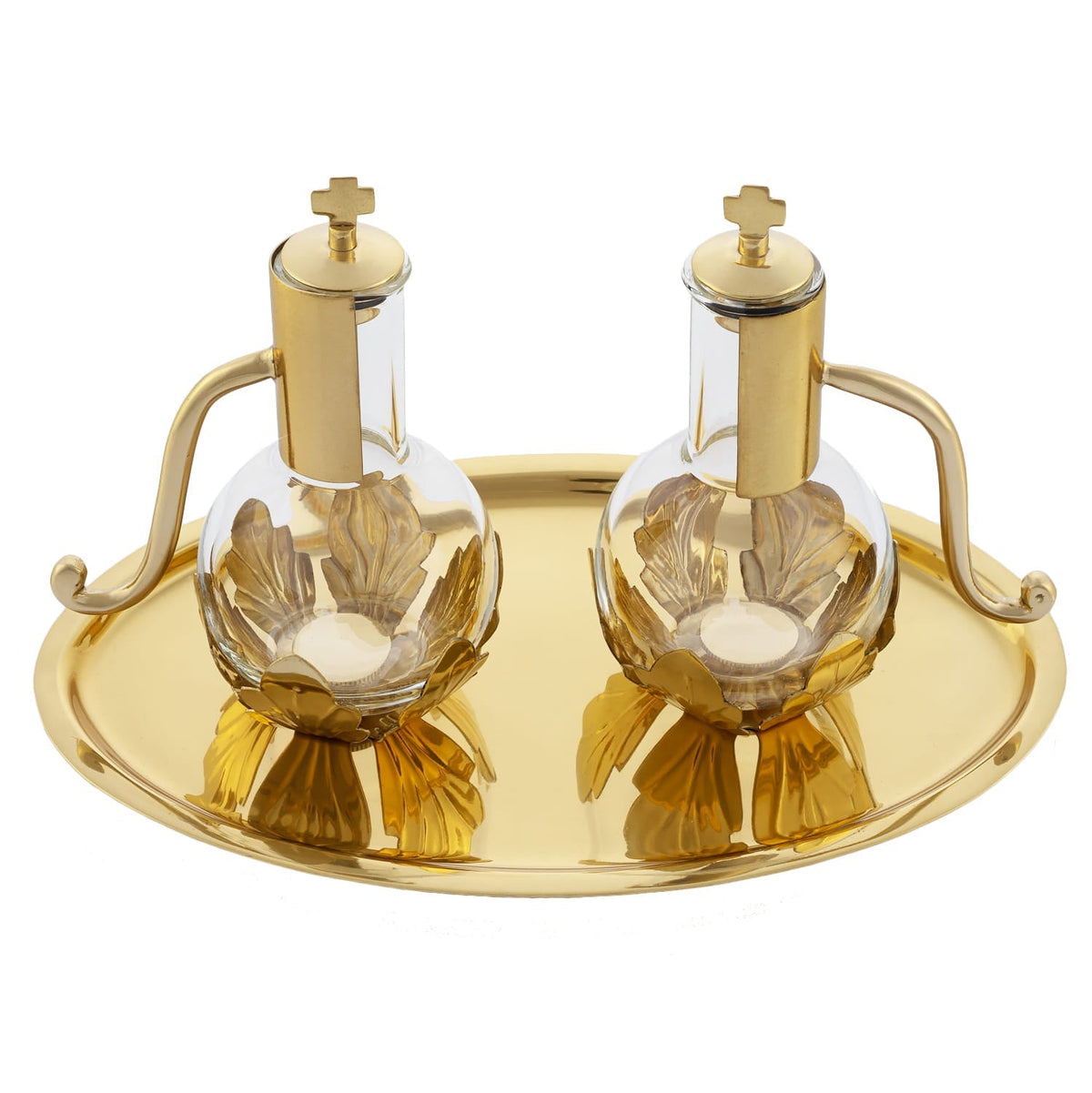 Brass cruet set with tray, elevated view showing clear cruets and layered leaf decoration